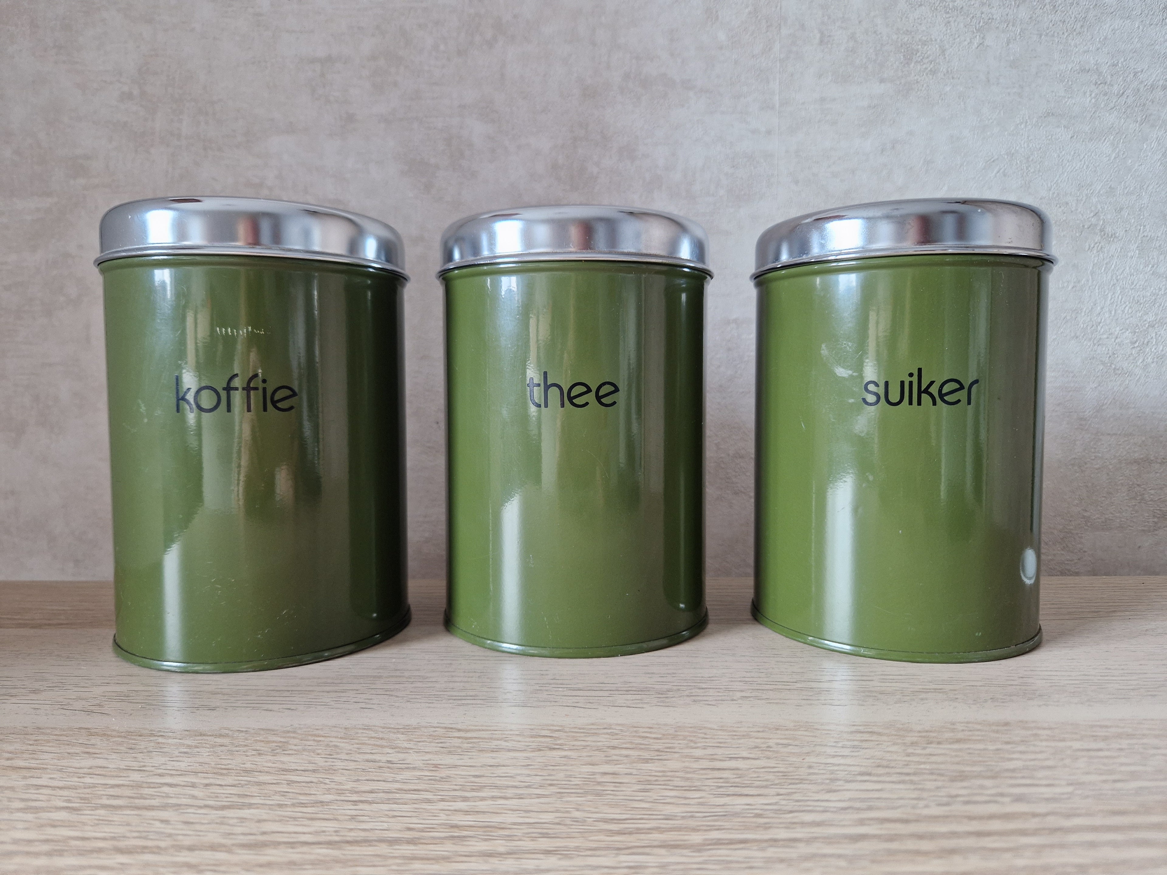 Groene blikken koffie thee suiker