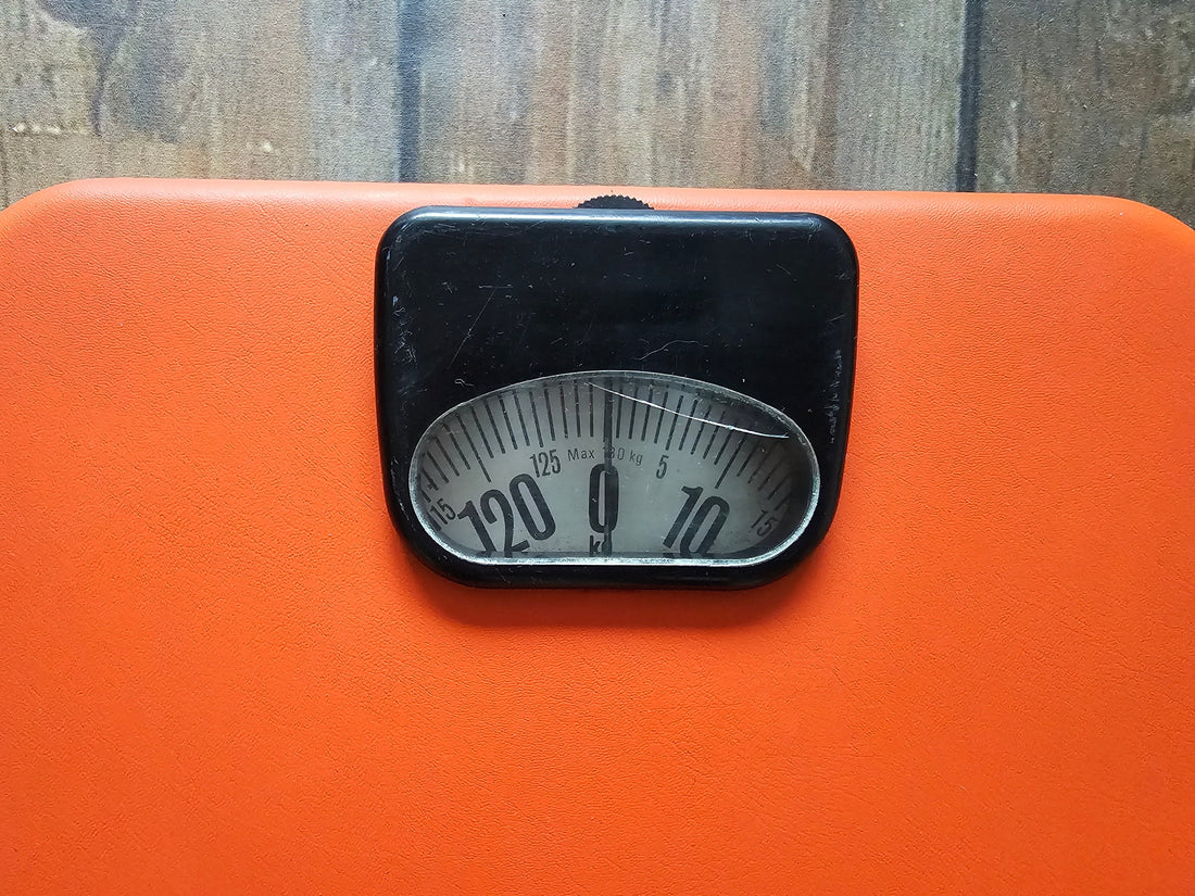 Oranje personen weegschaal