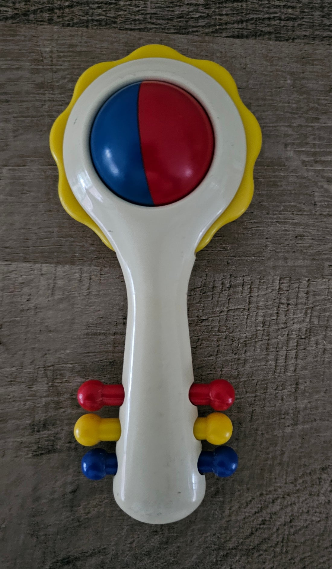 Vintage rammelaar Ambi Toys