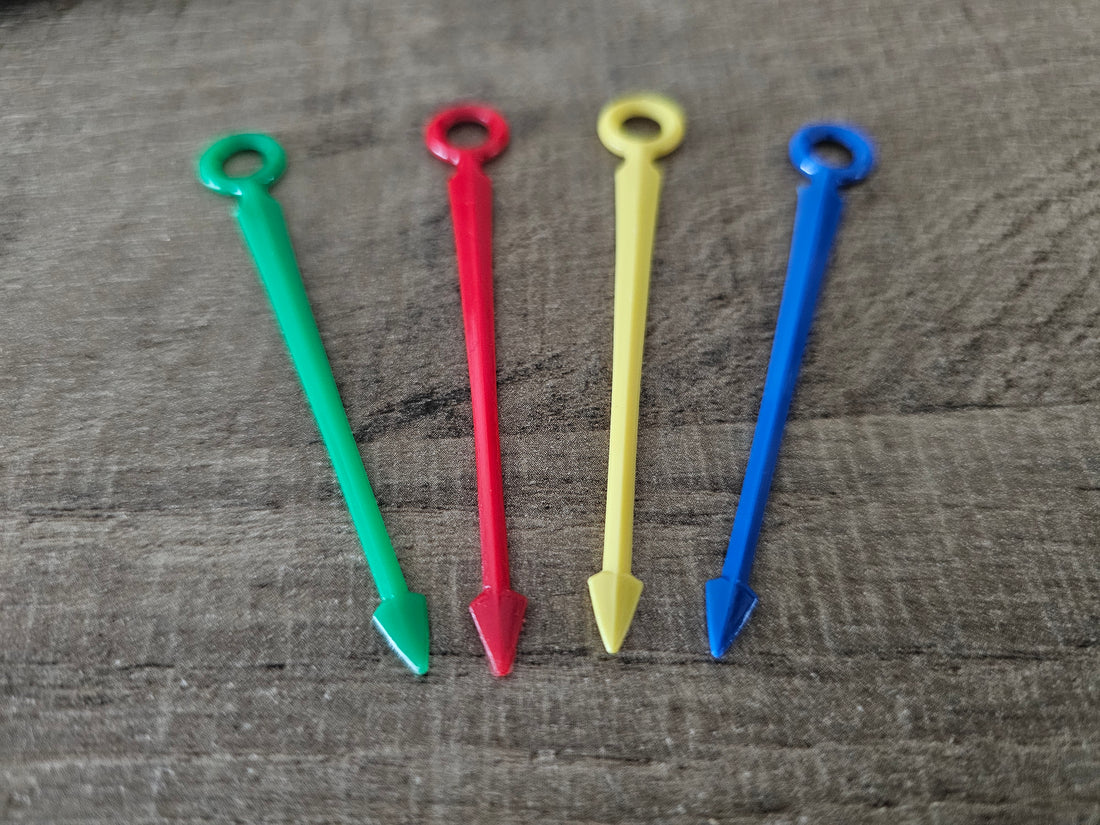 Vintage gekleurde cocktail prikkers