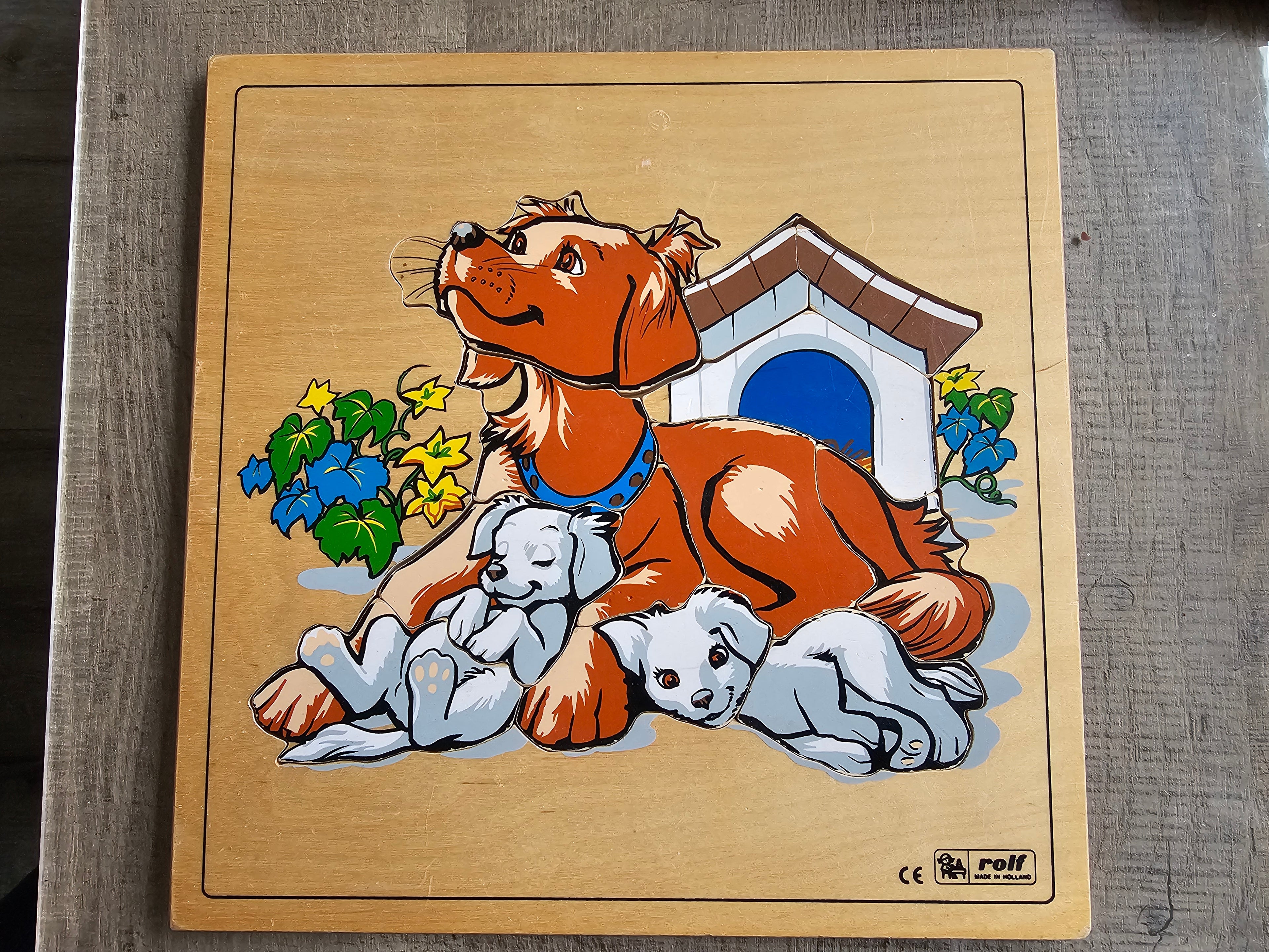 Rolf houten puzzel honden bij het hok