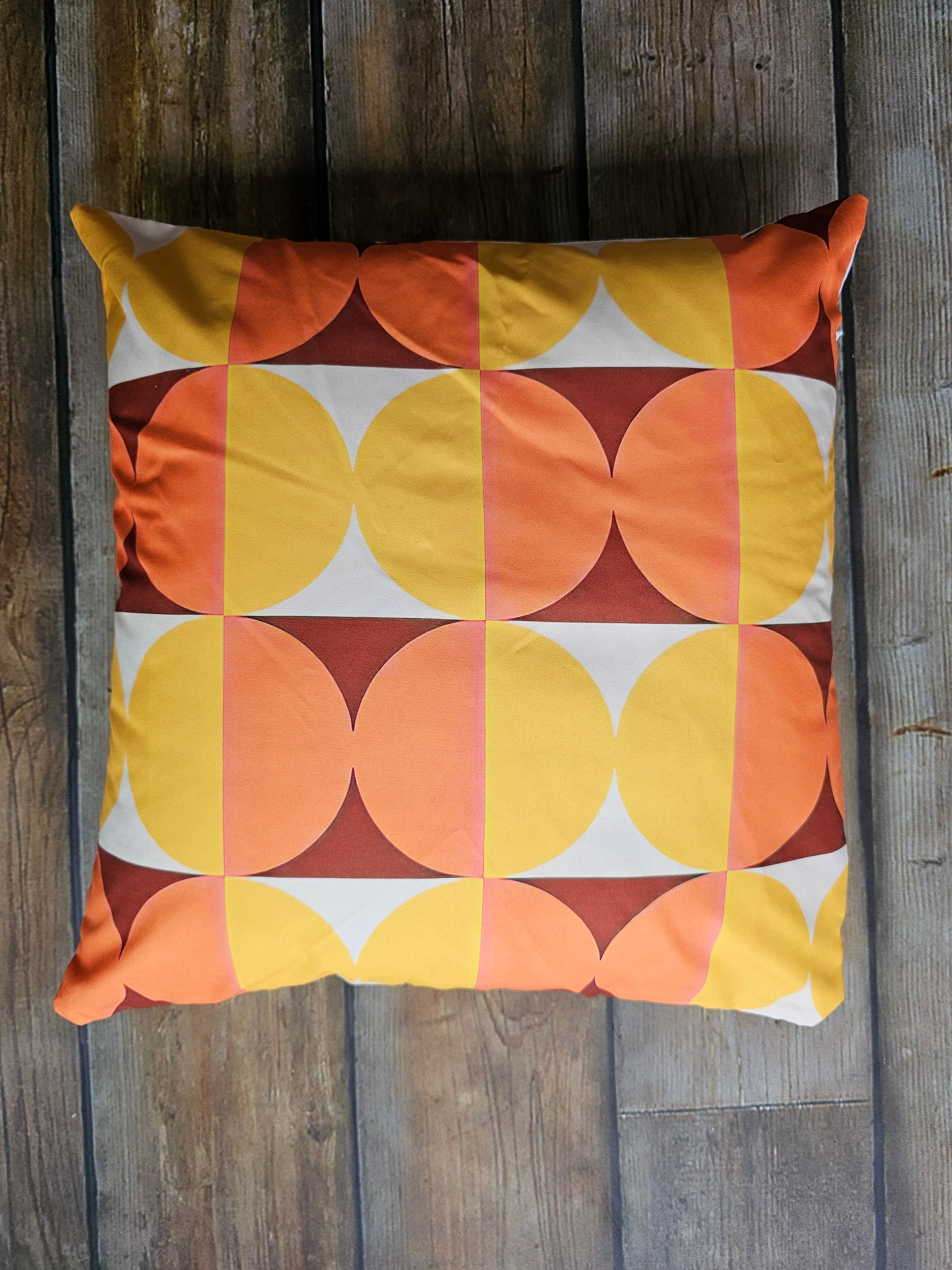 Retro kussenhoes oranje cirkels