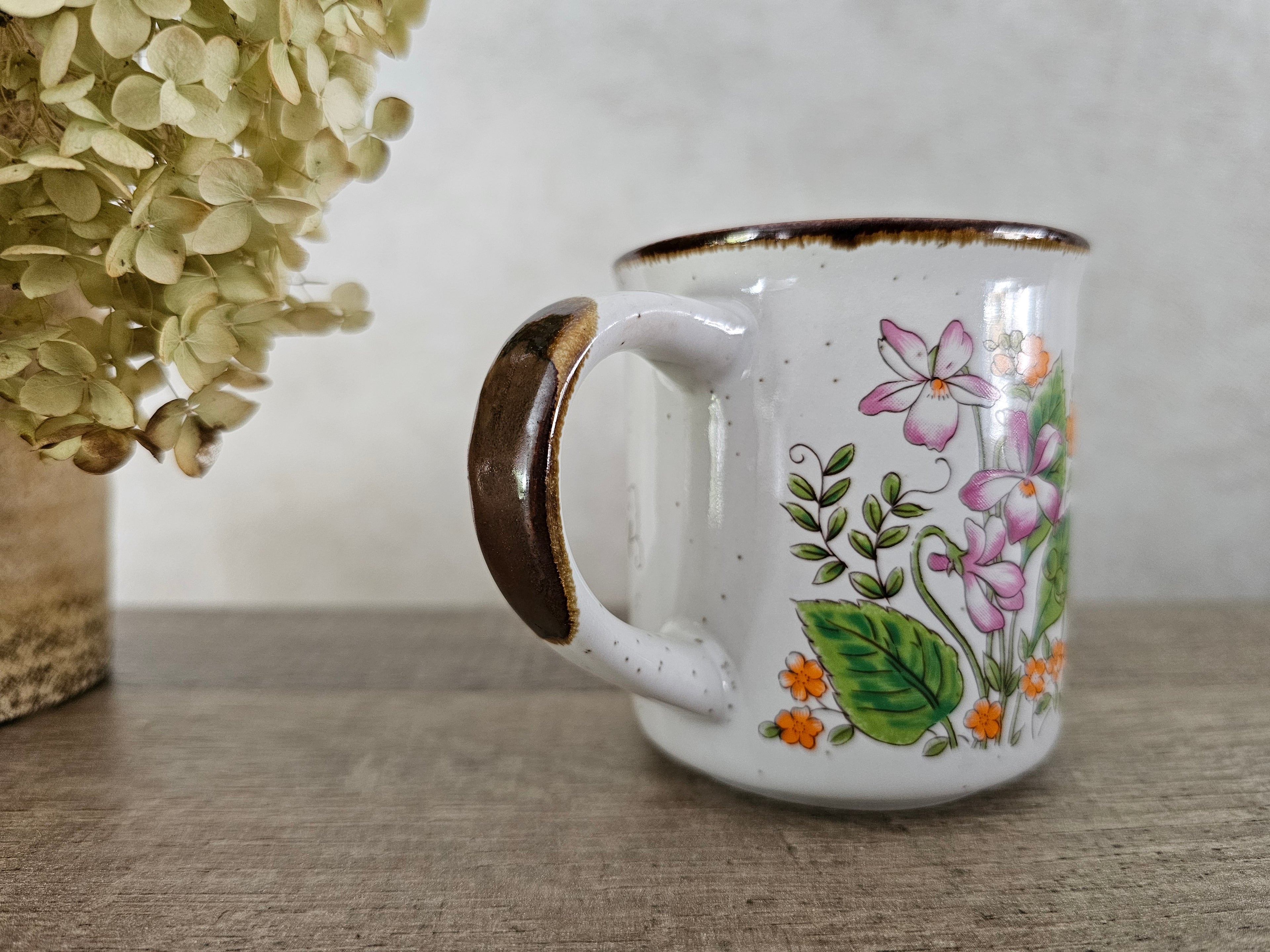 Vintage koffie beker wilde bloemen