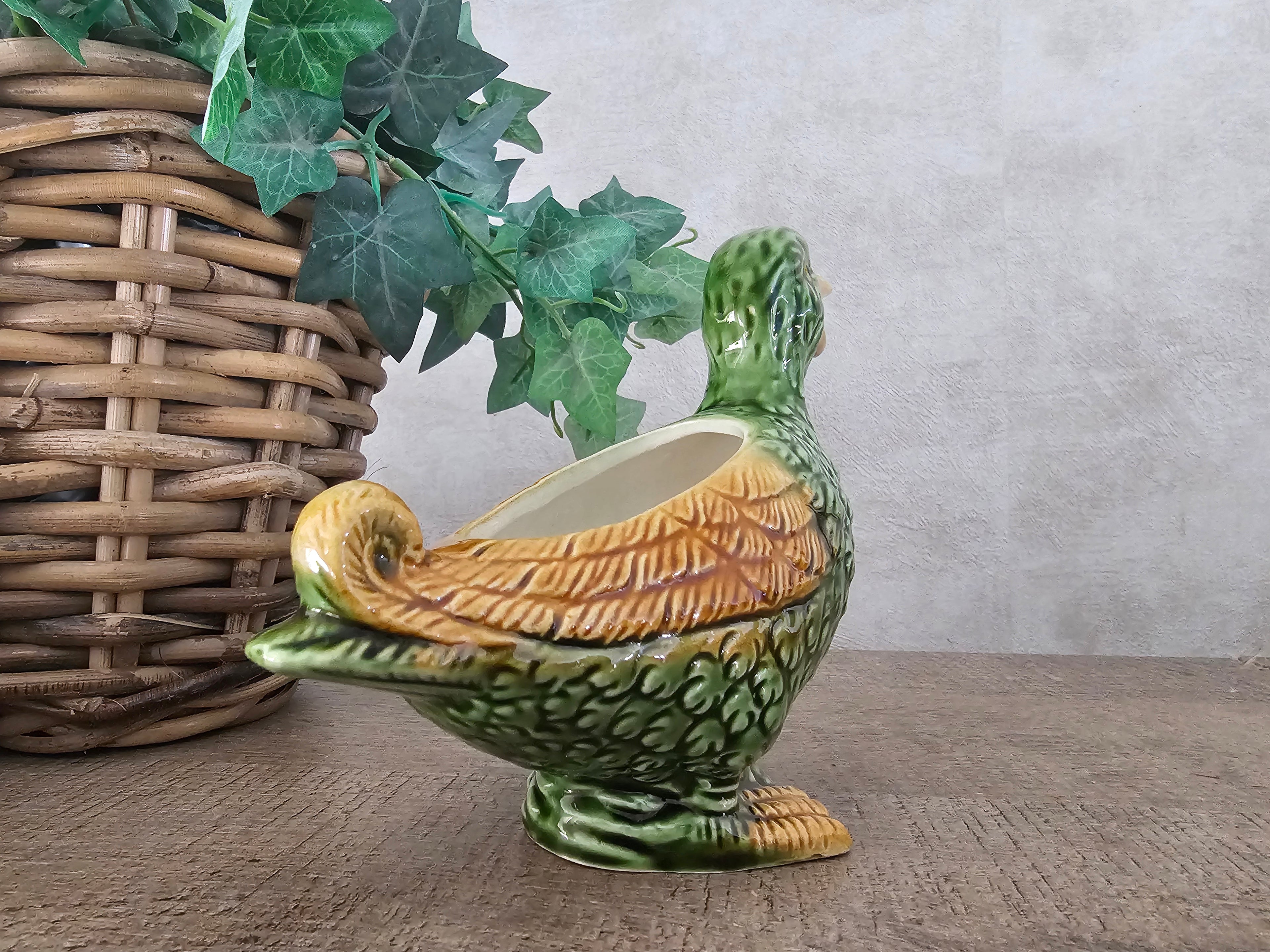 Keramiek vogel sauskom juskom