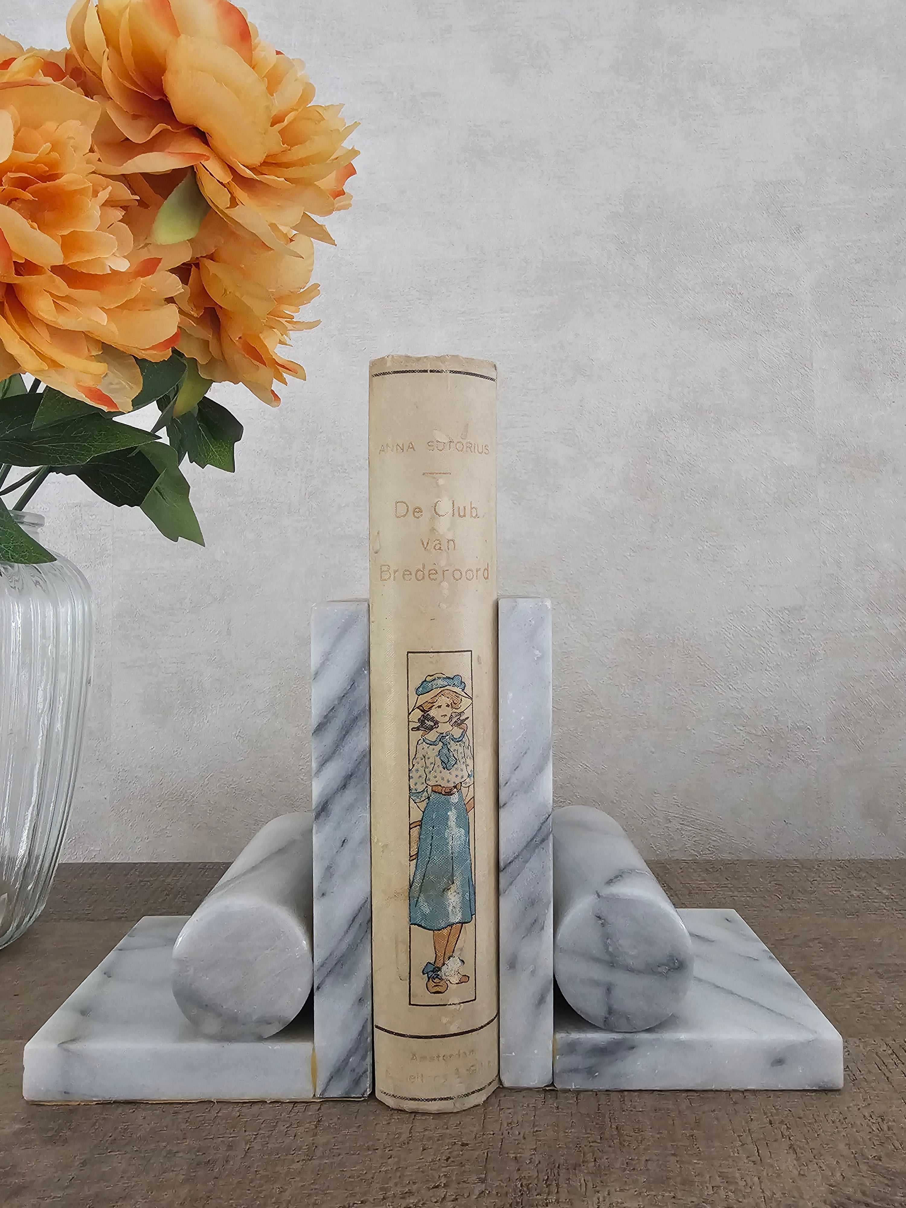 Marmeren boekensteunen