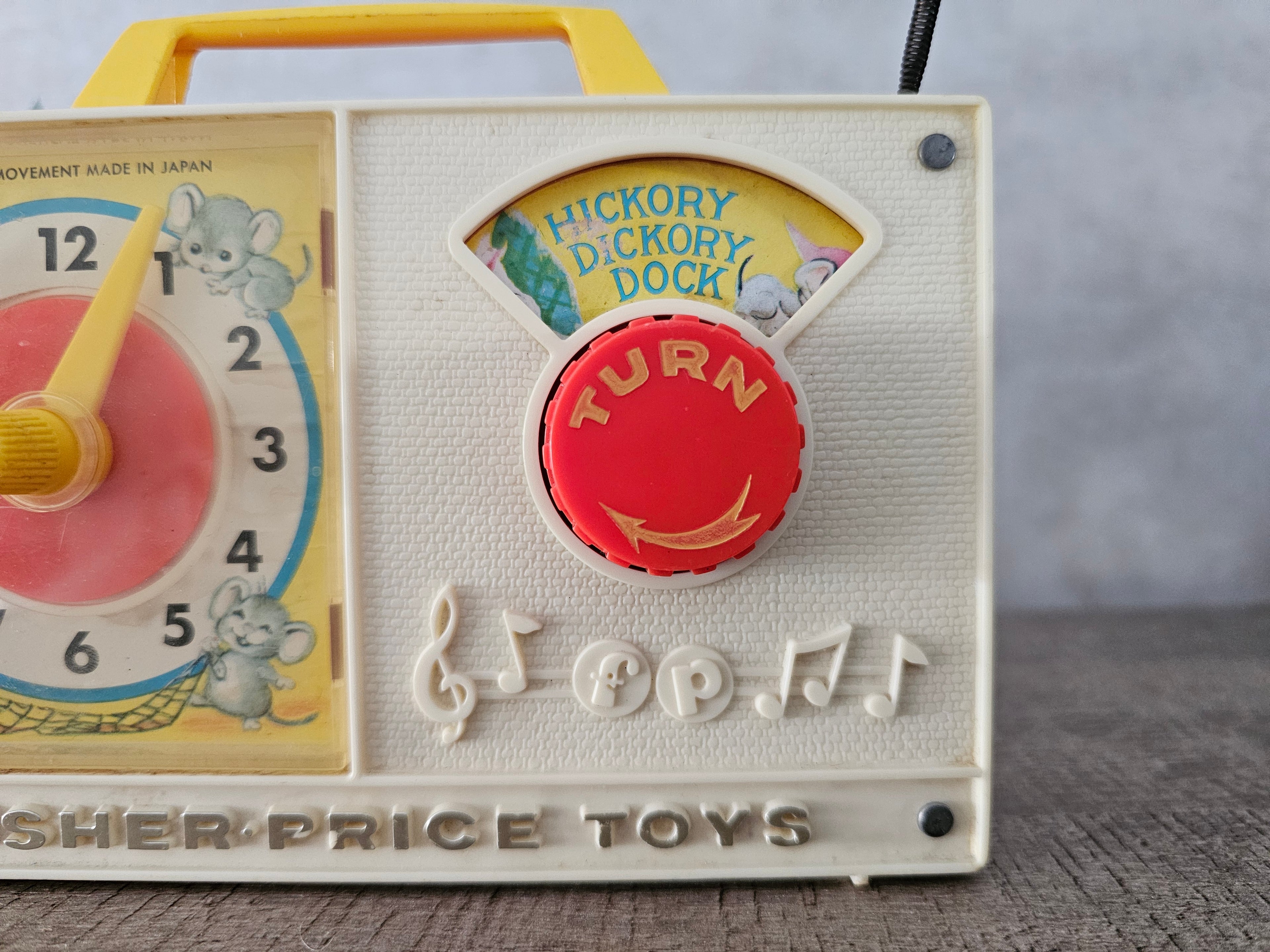 Fisher price vintage muziekdoosje met klok
