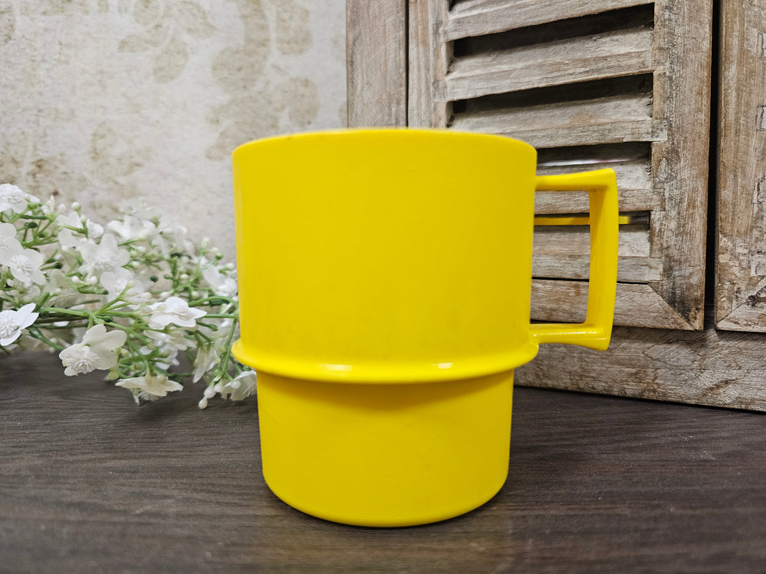Tupperware gele koffie beker
