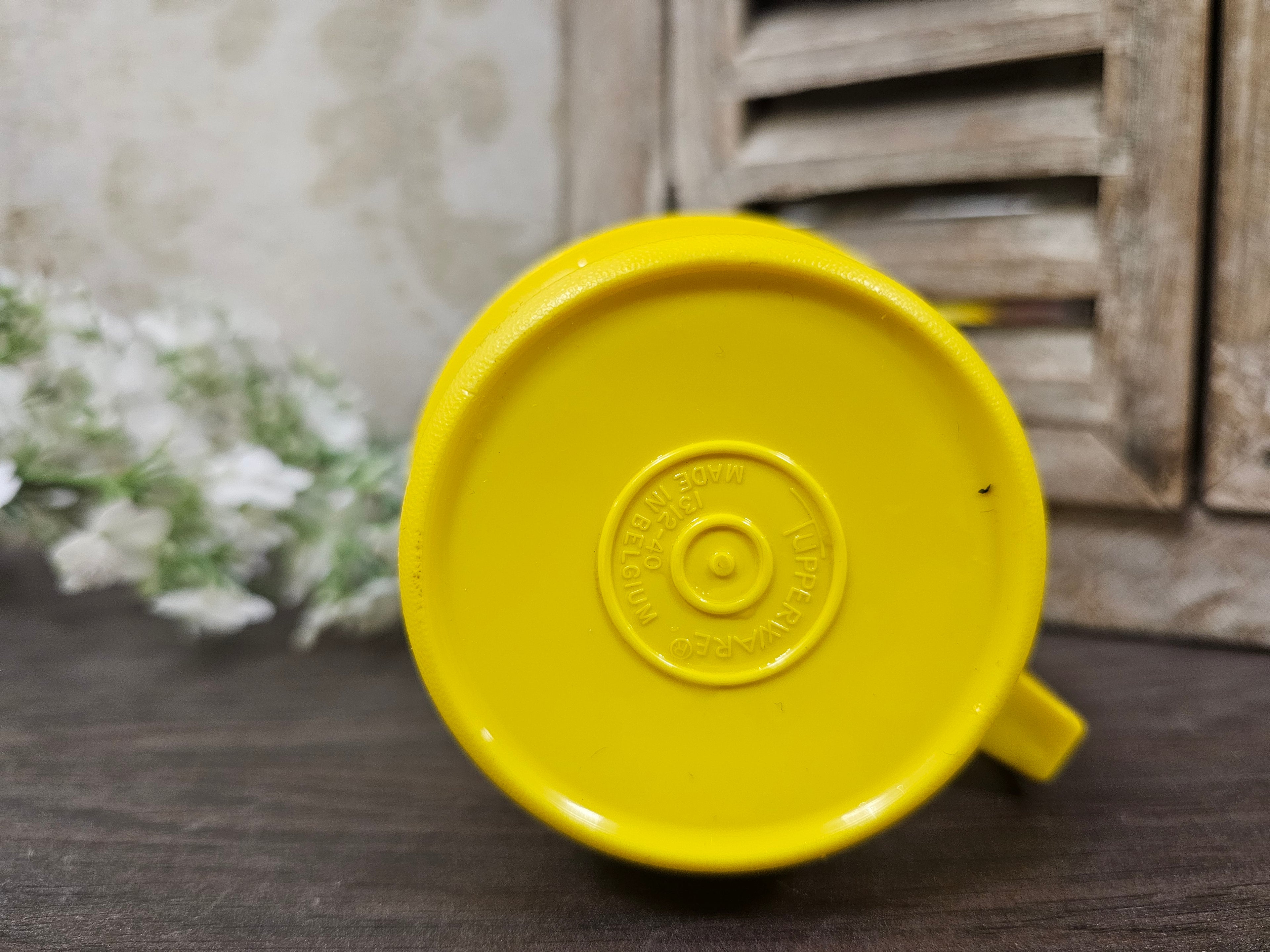 Tupperware gele koffie beker