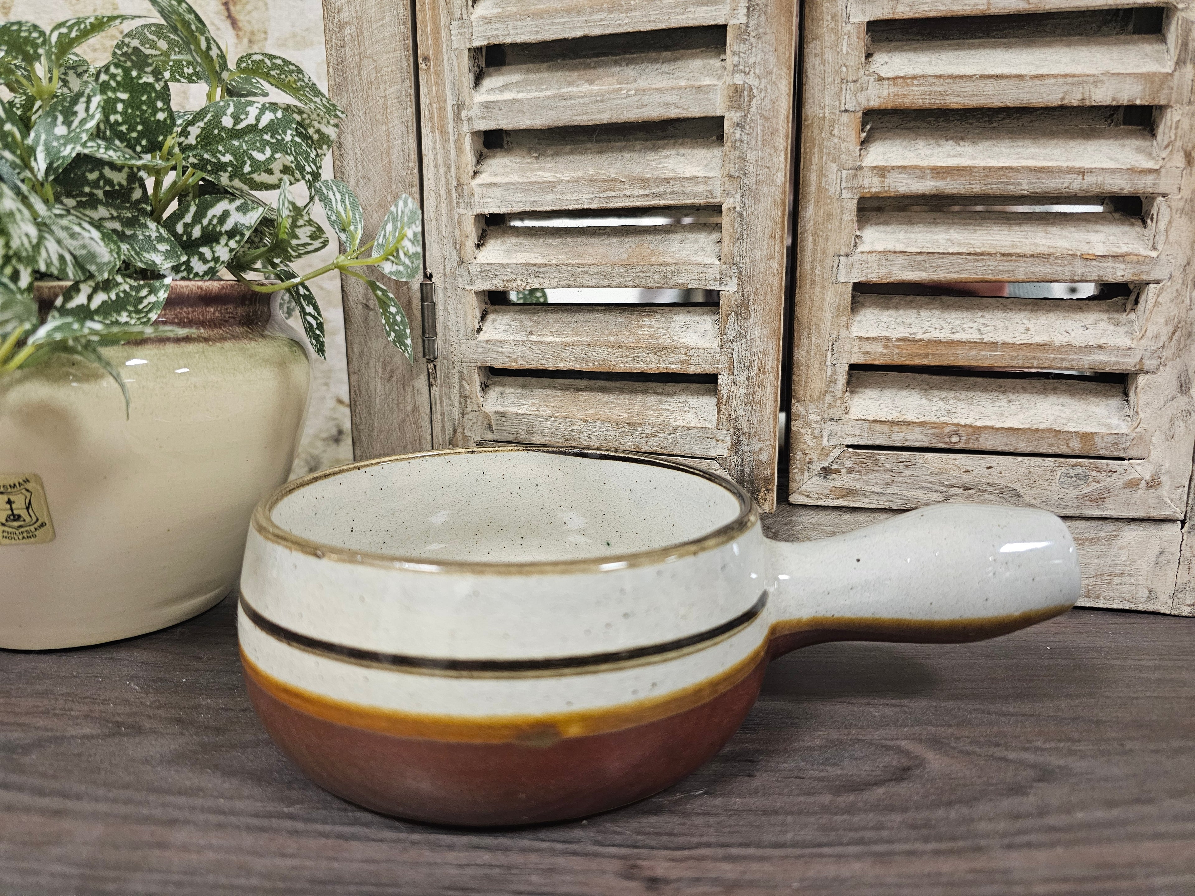 Soepkom met handvat