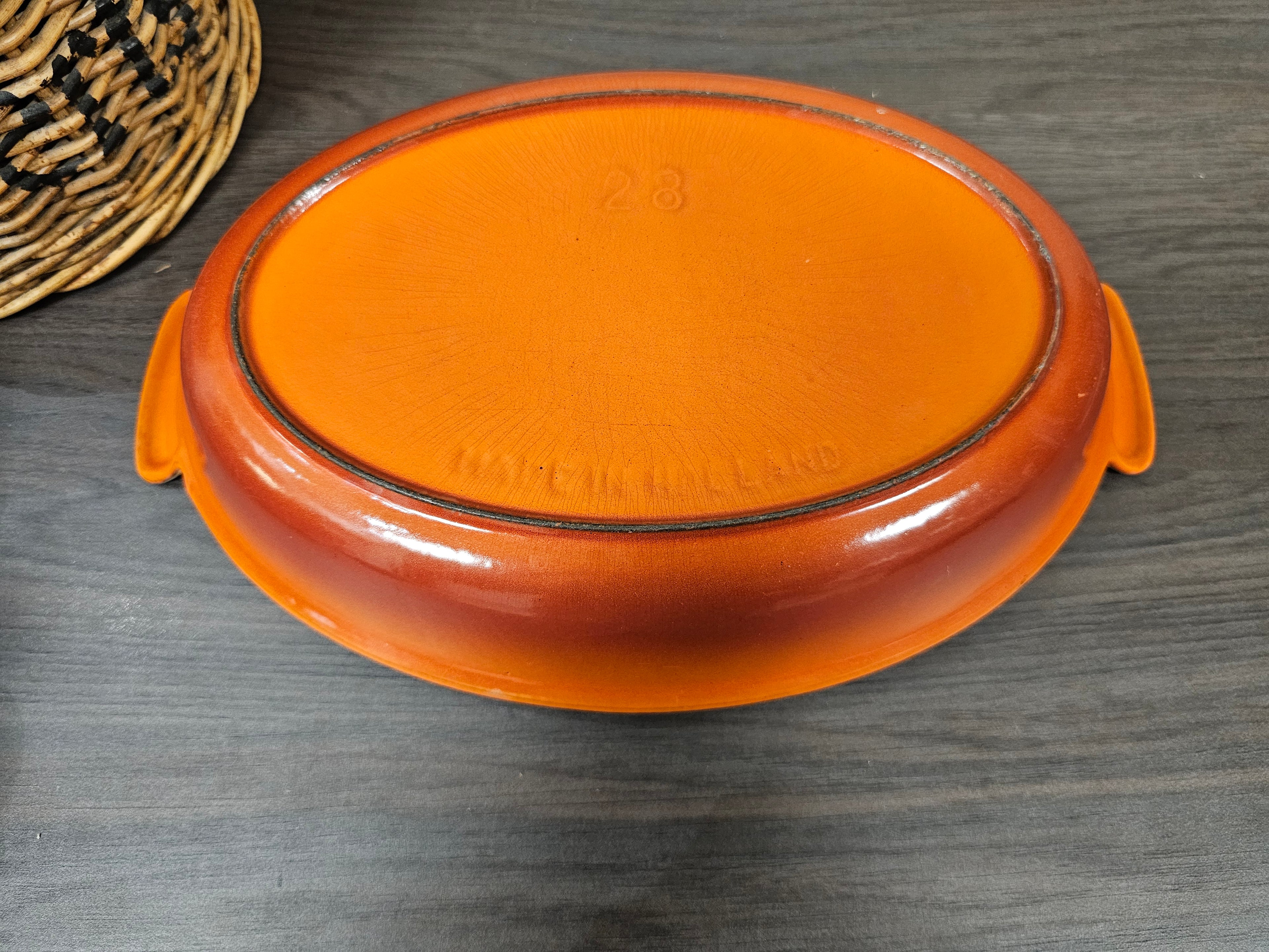 Dru gietijzeren oranje ovenschaal