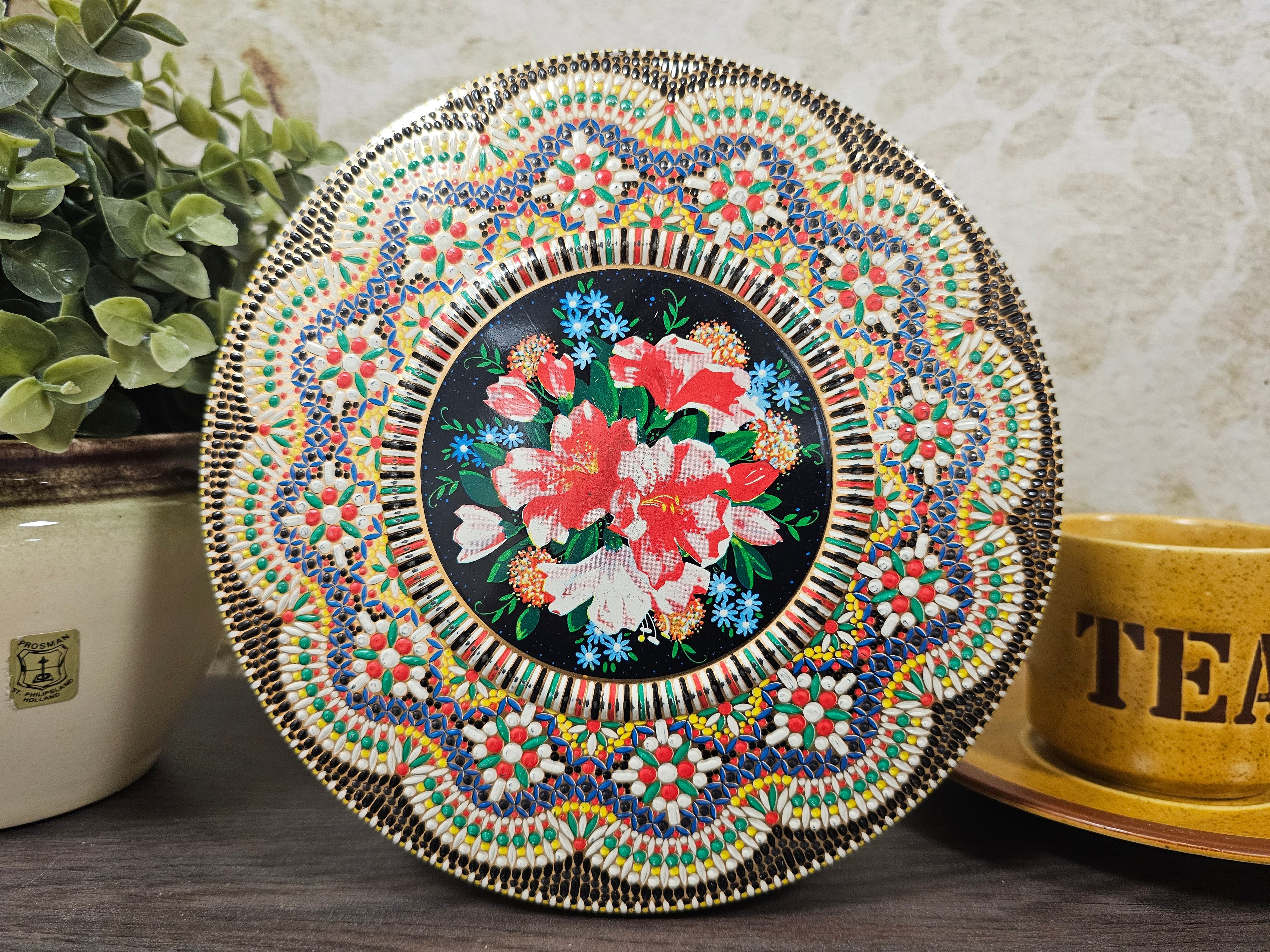 Mozaïk rond blik met bloemen