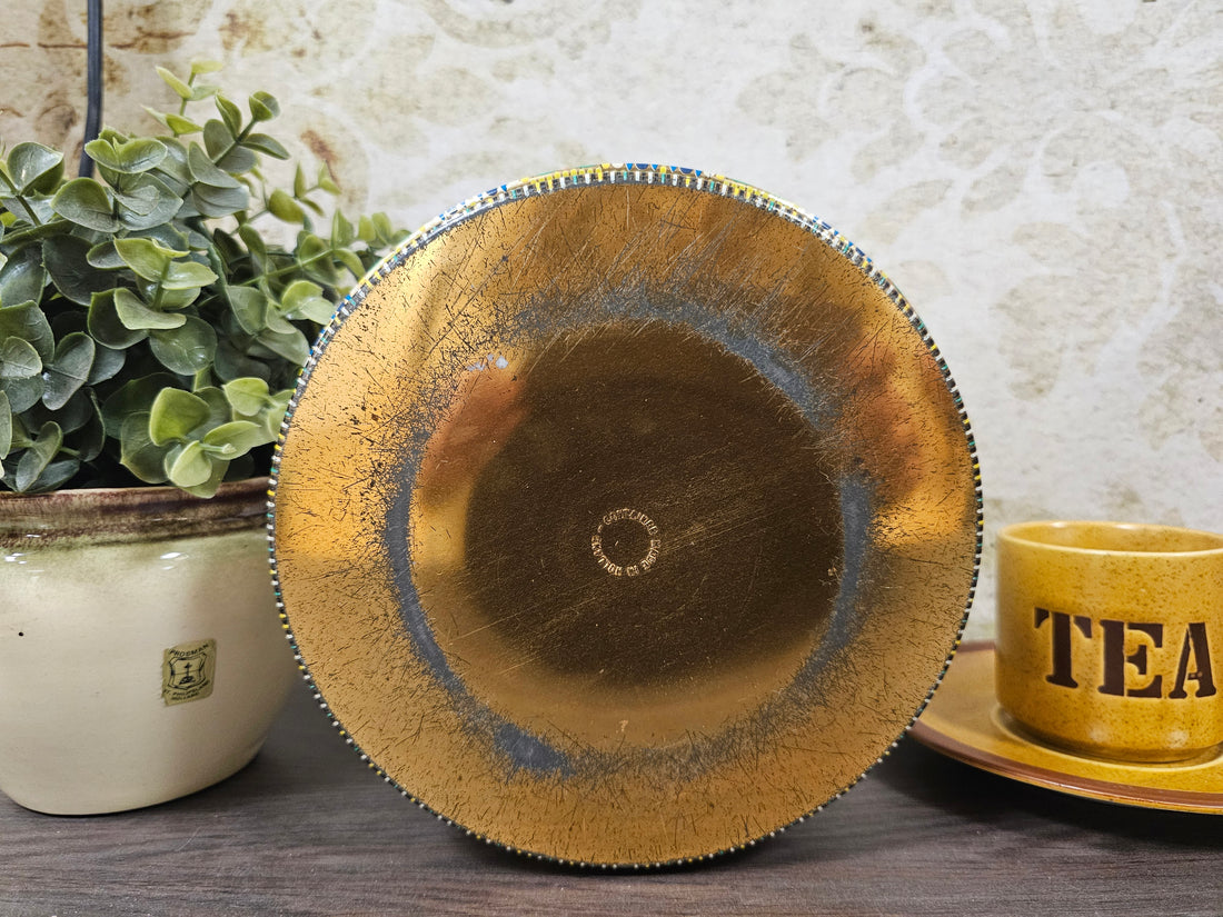 Mozaïk rond blik met bloemen