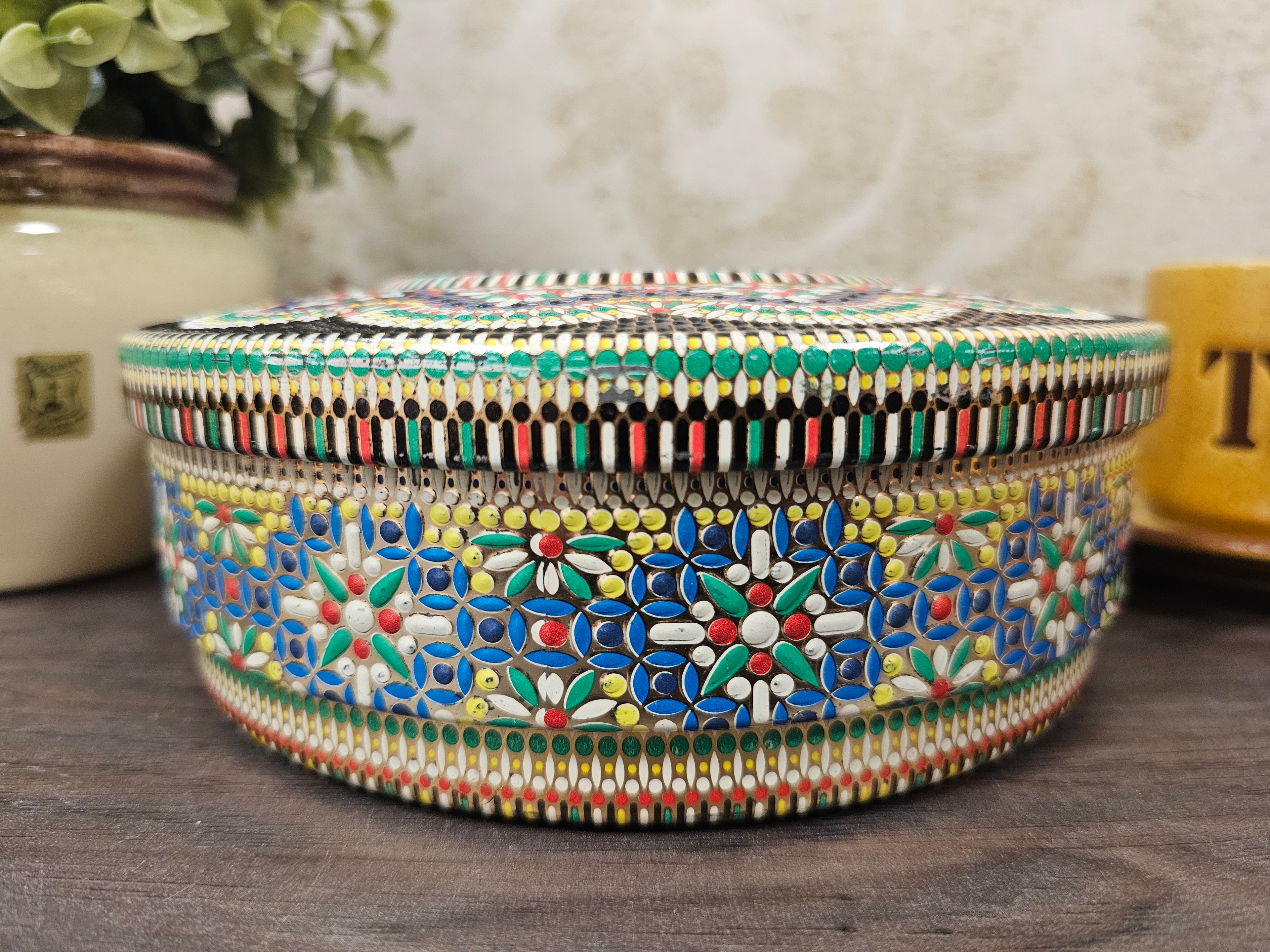 Mozaïk rond blik met bloemen