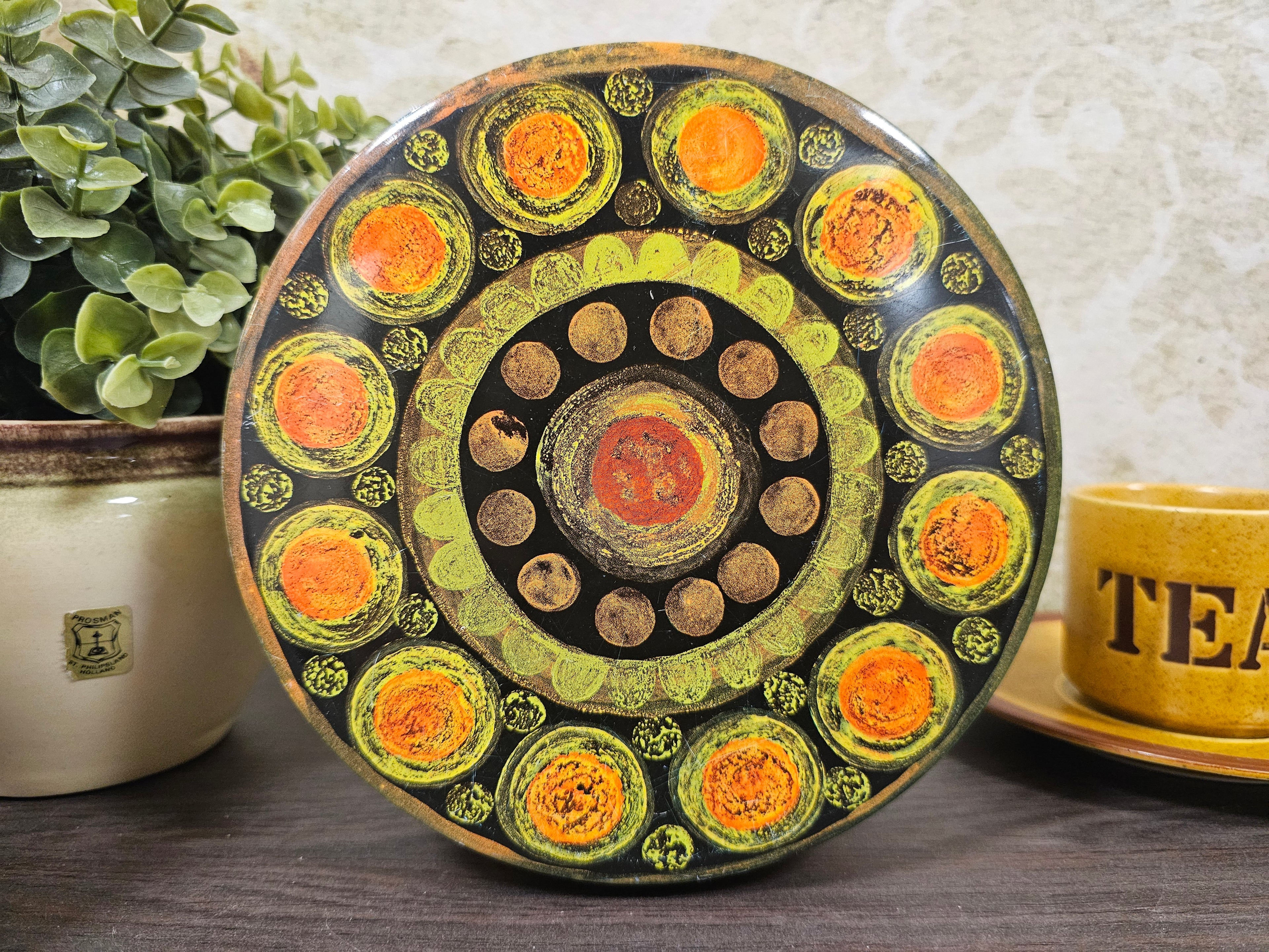 Koektrommel oranje groen cirkels