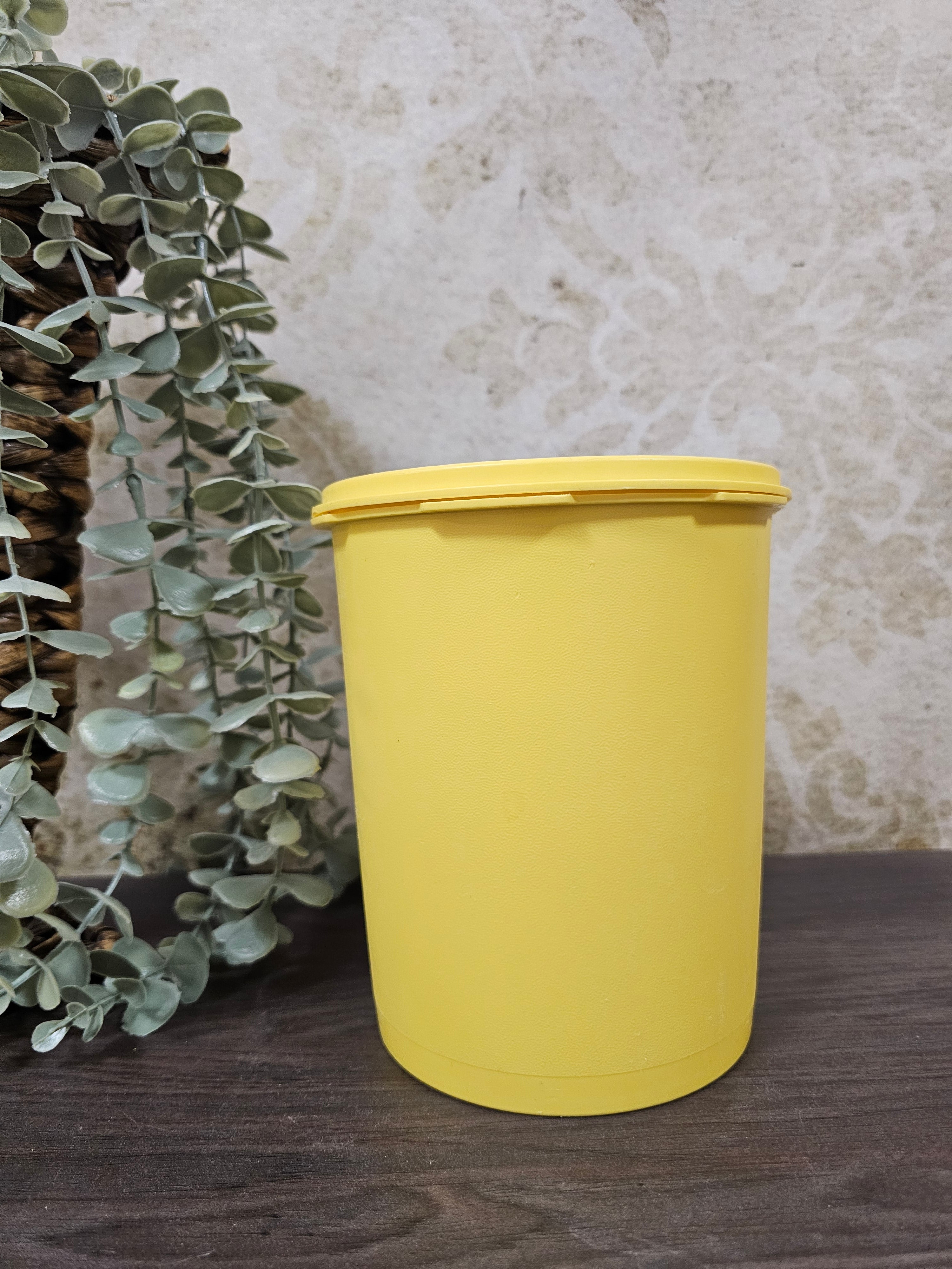 Tupperware gele trommel sterdeksel