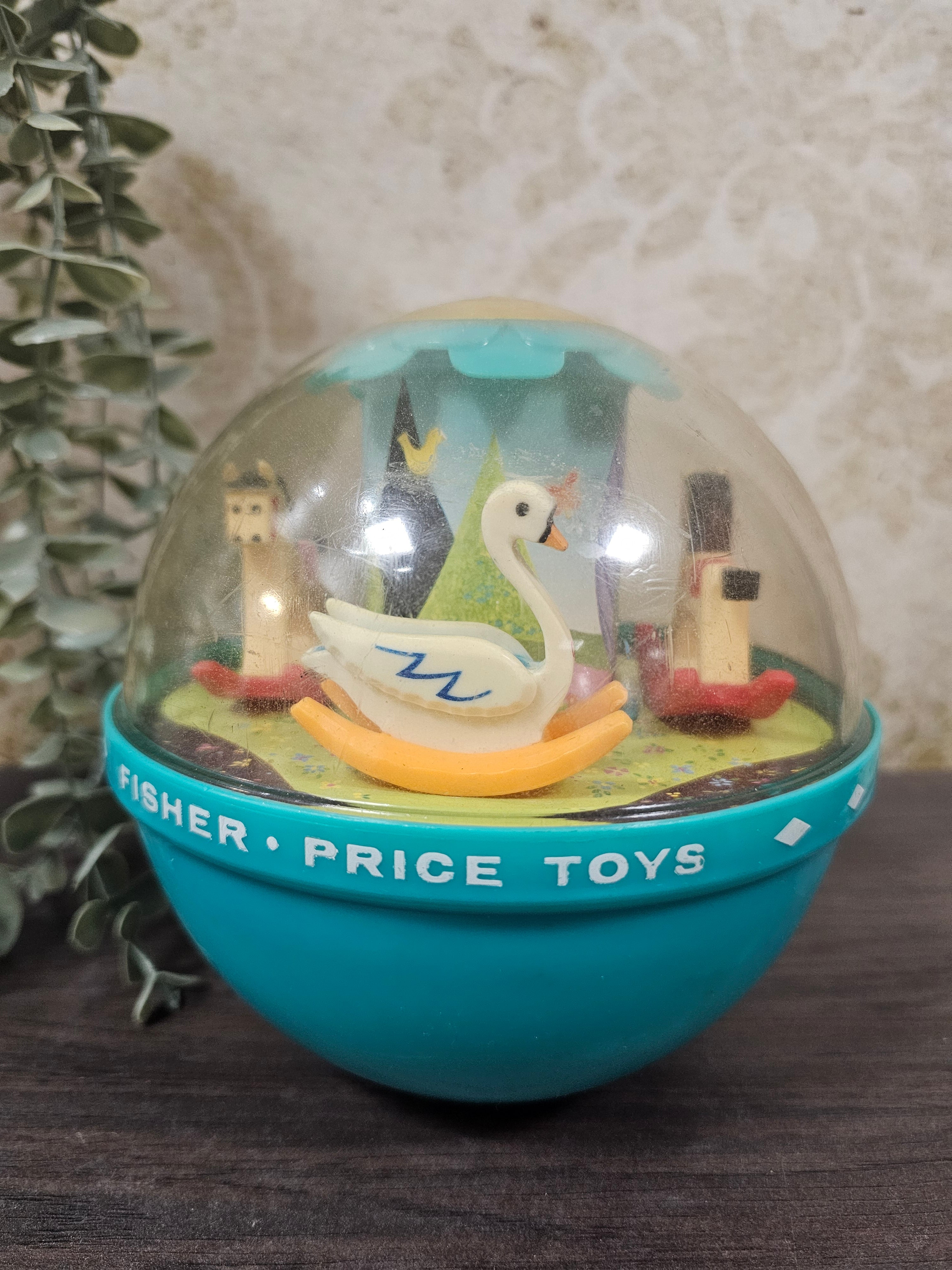 Vintage speelgoed Fisher price roly poly chime bal uit 1972