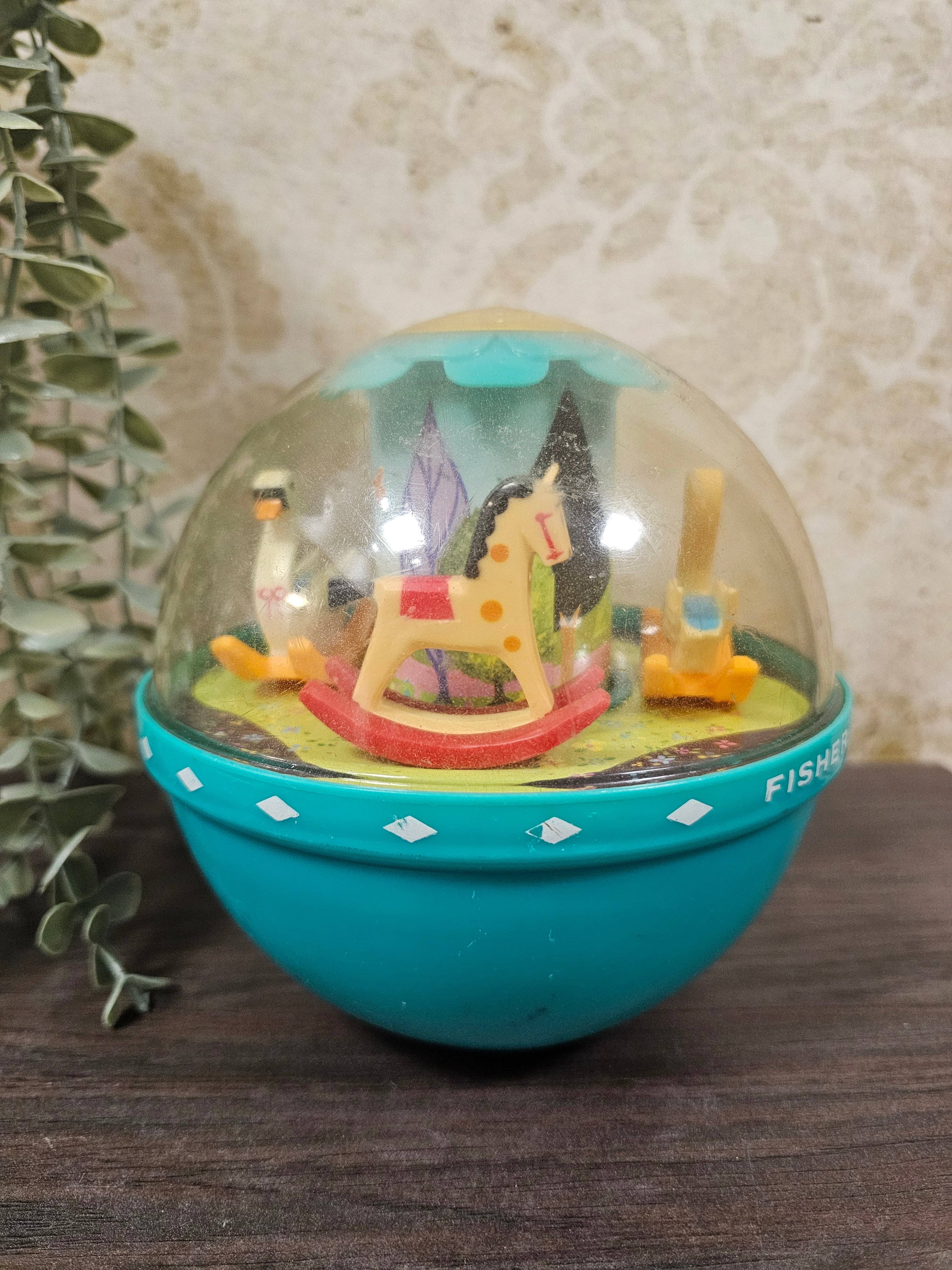 Vintage speelgoed Fisher price roly poly chime bal uit 1972