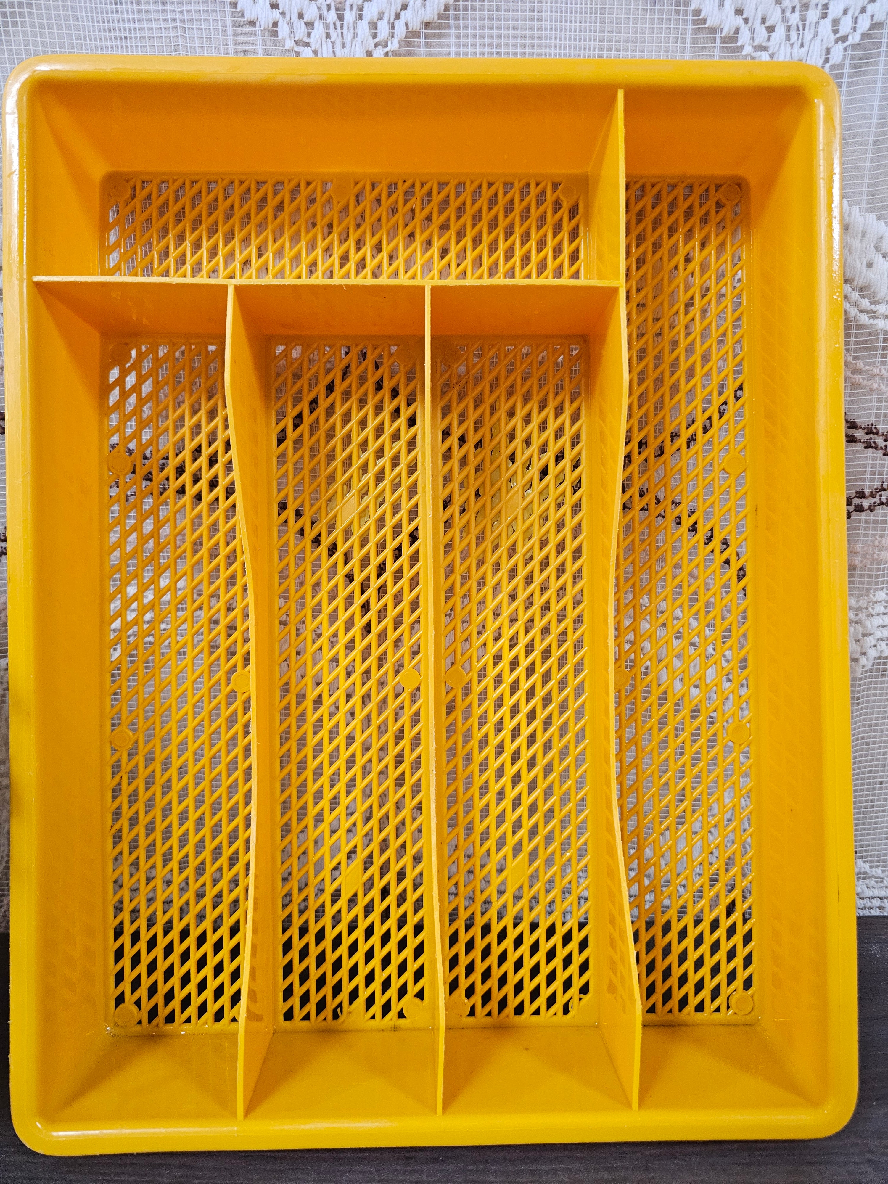 Oranje vintage kunststof bestekmand