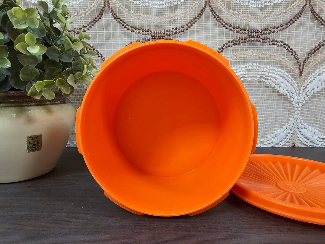 Tupperware oranje trommel sterdeksel