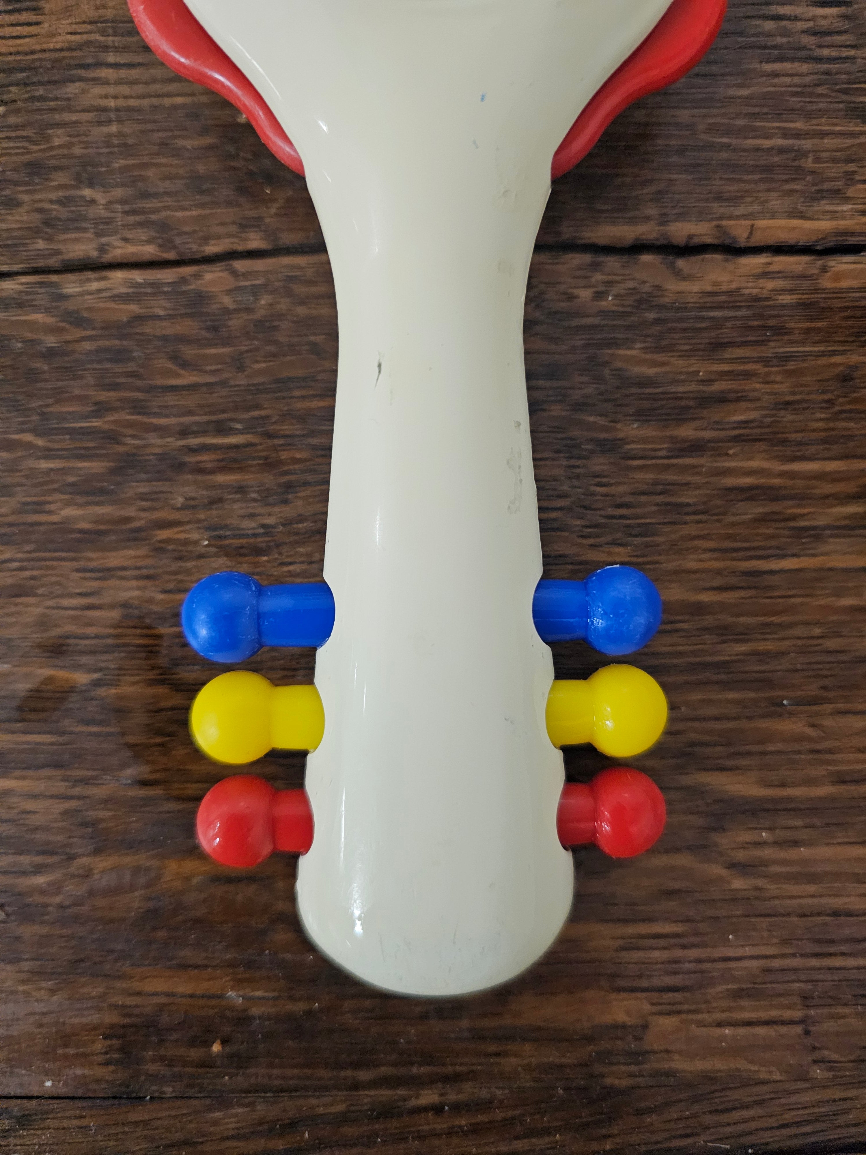 Ambi Toys rammelaar handy dandy rode rand