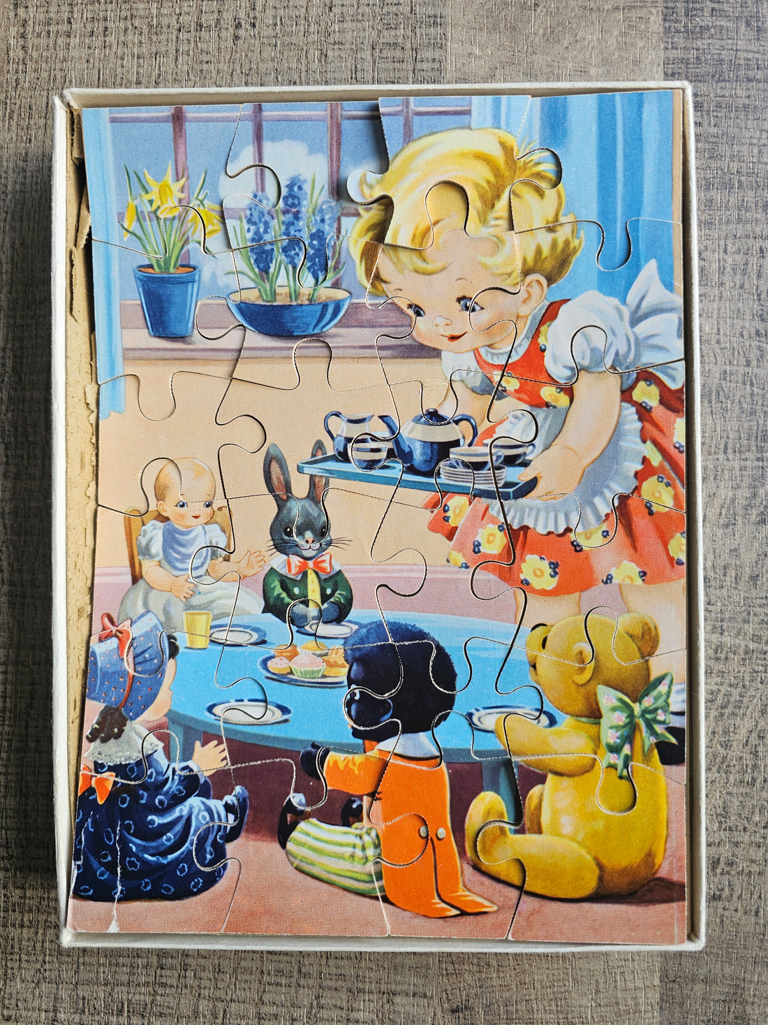 Houten vintage puzzel jaren 60 meisje en poppen