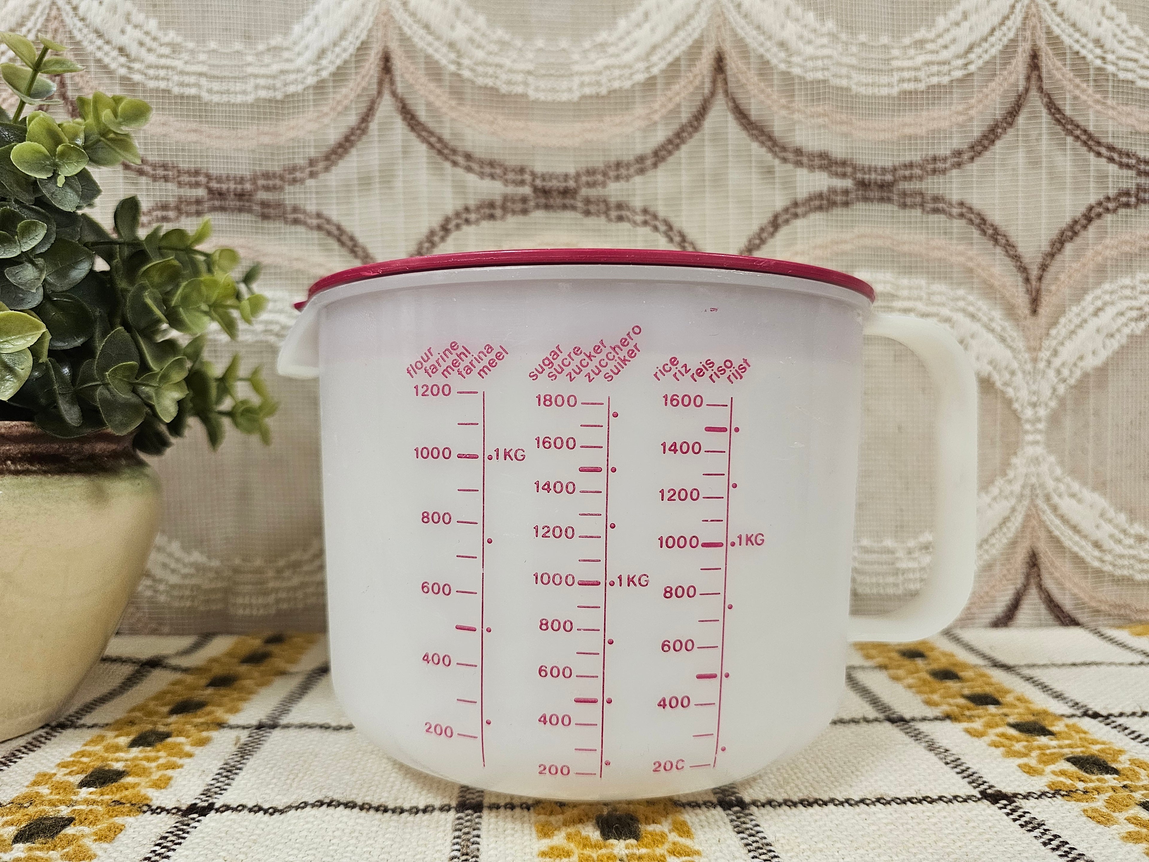 Tupperware maatbeker 2 liter met roze deksel