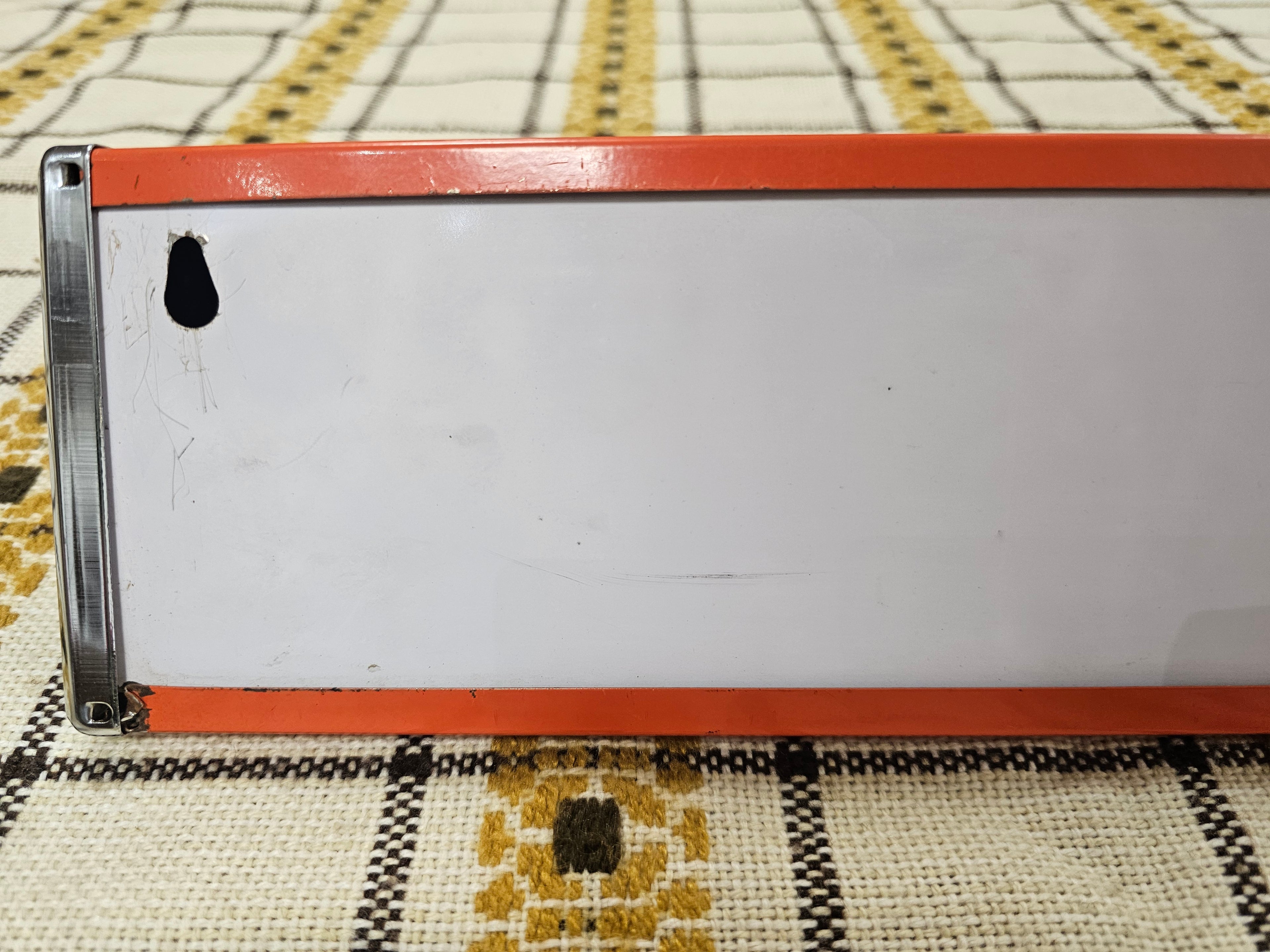 Brabantia planchet oranje metaal jaren 70 wandrek