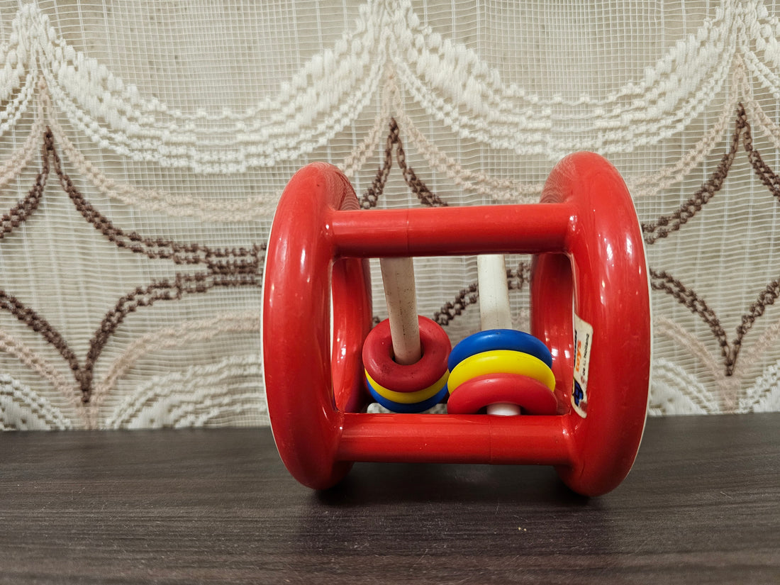 Vintage Ambi Toys rammelaar – rollend babyspeelgoed met kleurrijke ringen