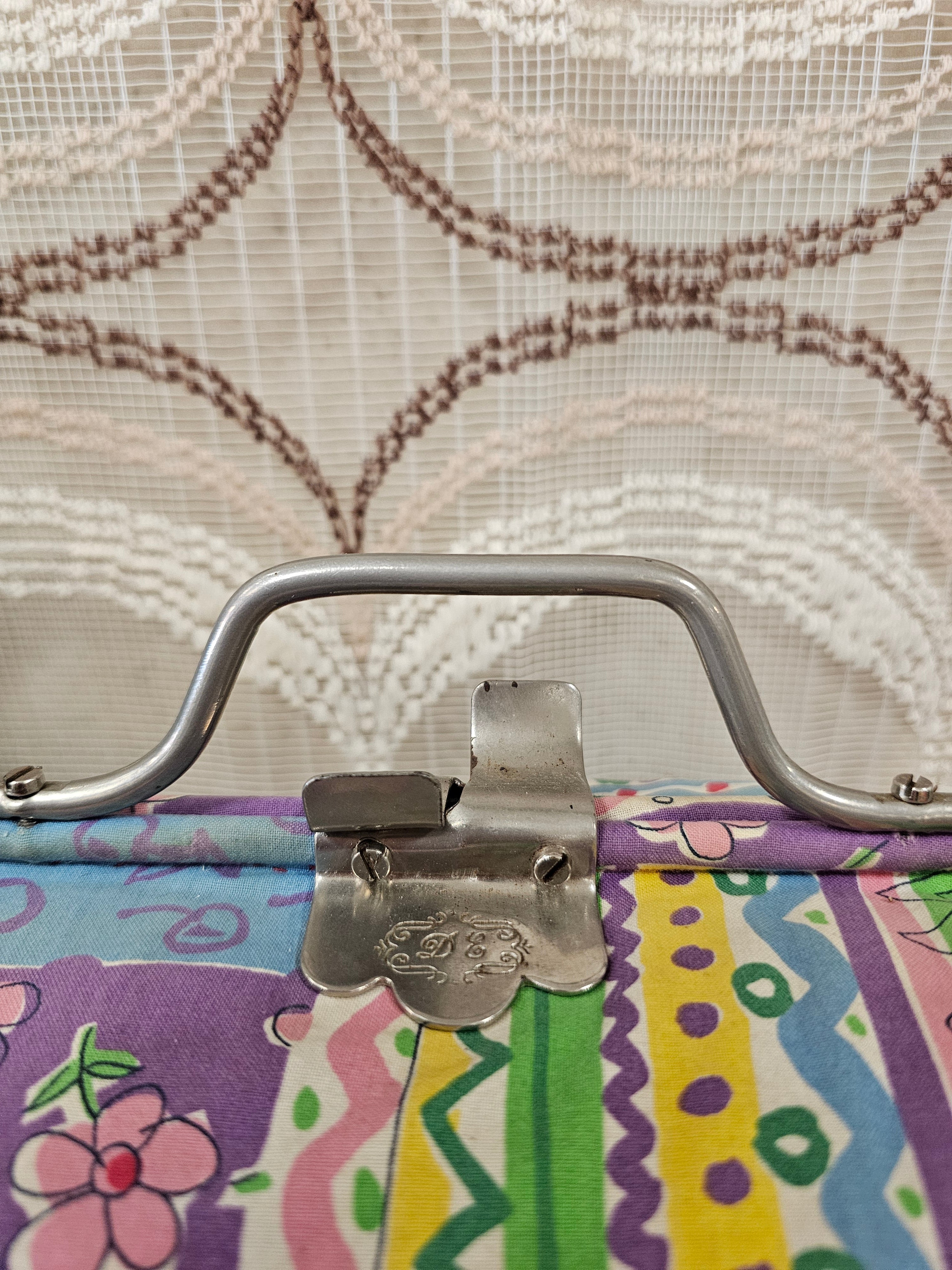 Vintage Douwe Egberts theebeurs met knip – bloemenpatroon