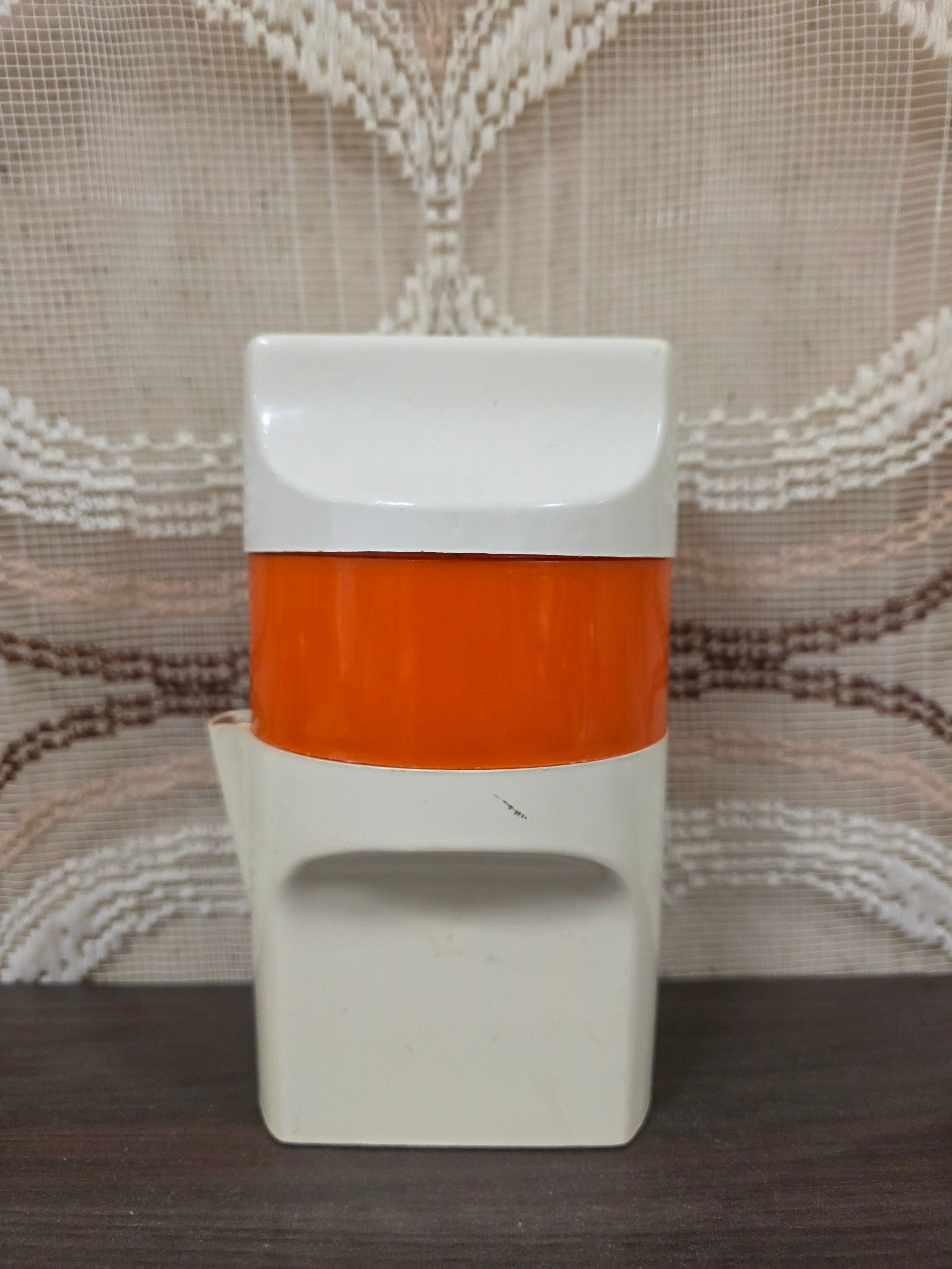 Vintage citruspers oranje wit kunststof