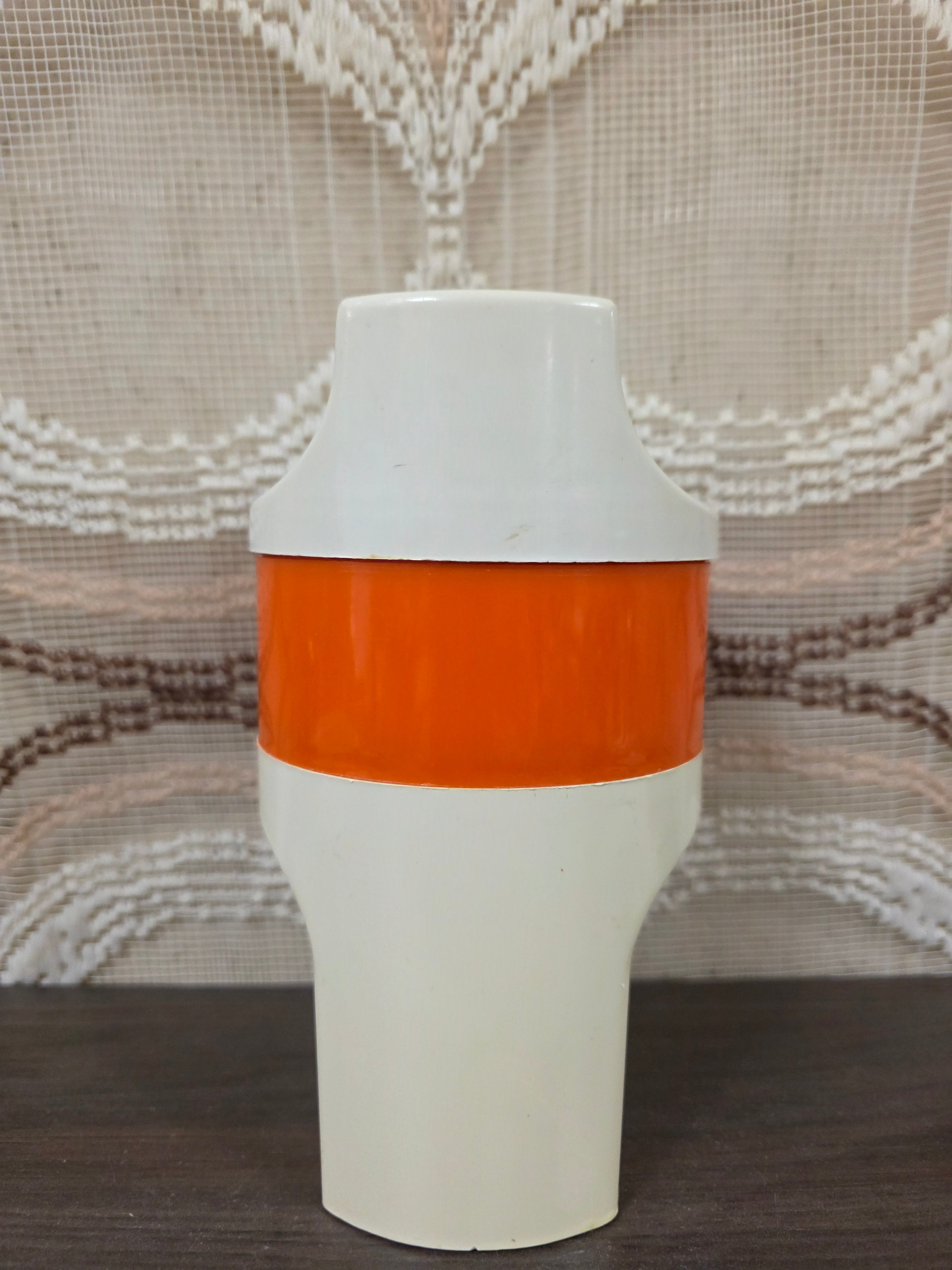 Vintage citruspers oranje wit kunststof