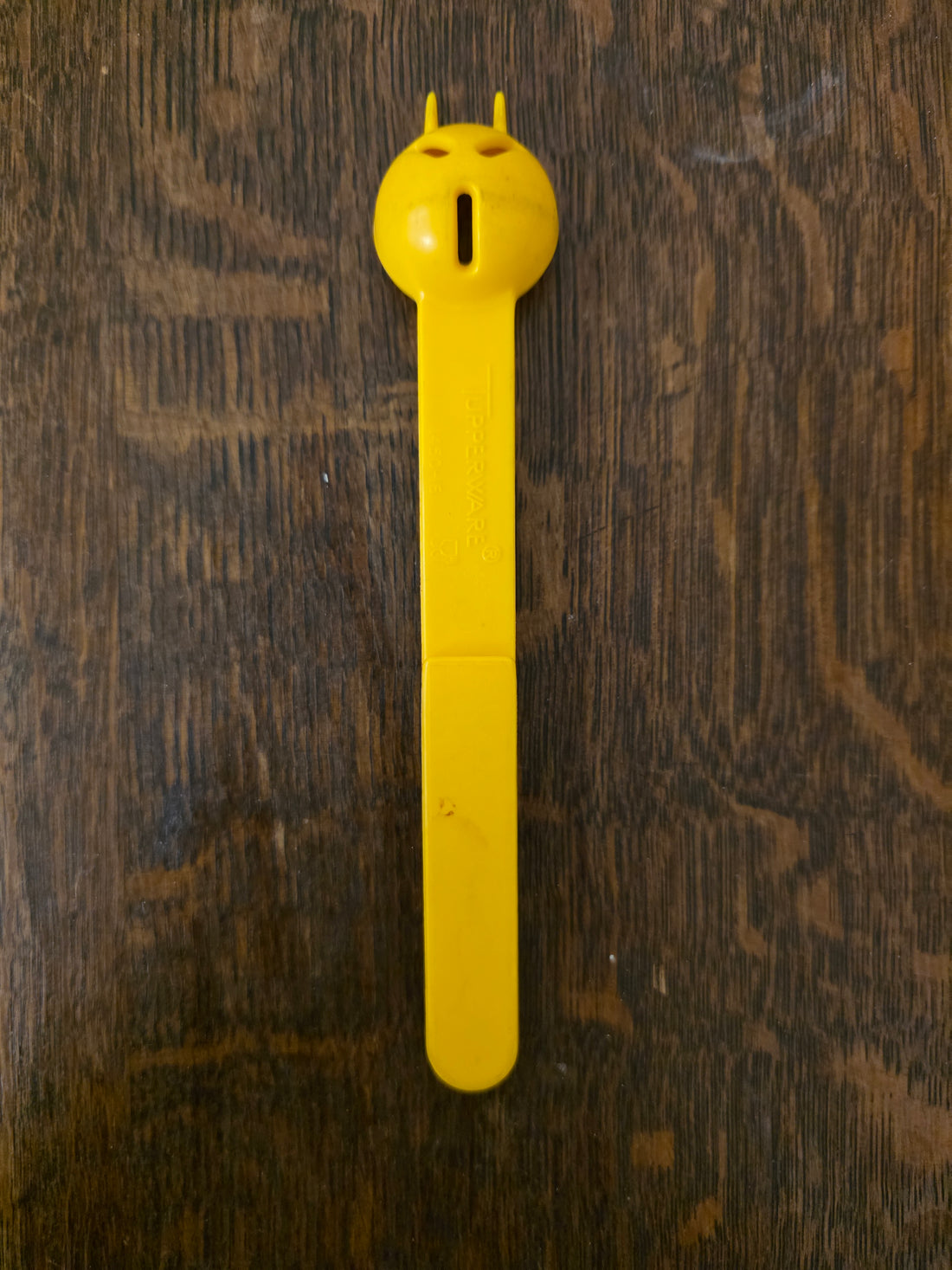 Tupperware zuurkatje geel