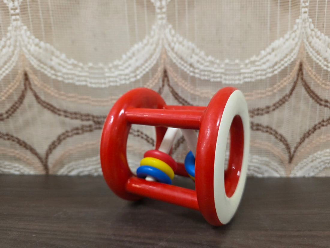 Vintage Ambi Toys rammelaar – rollend babyspeelgoed met kleurrijke ringen