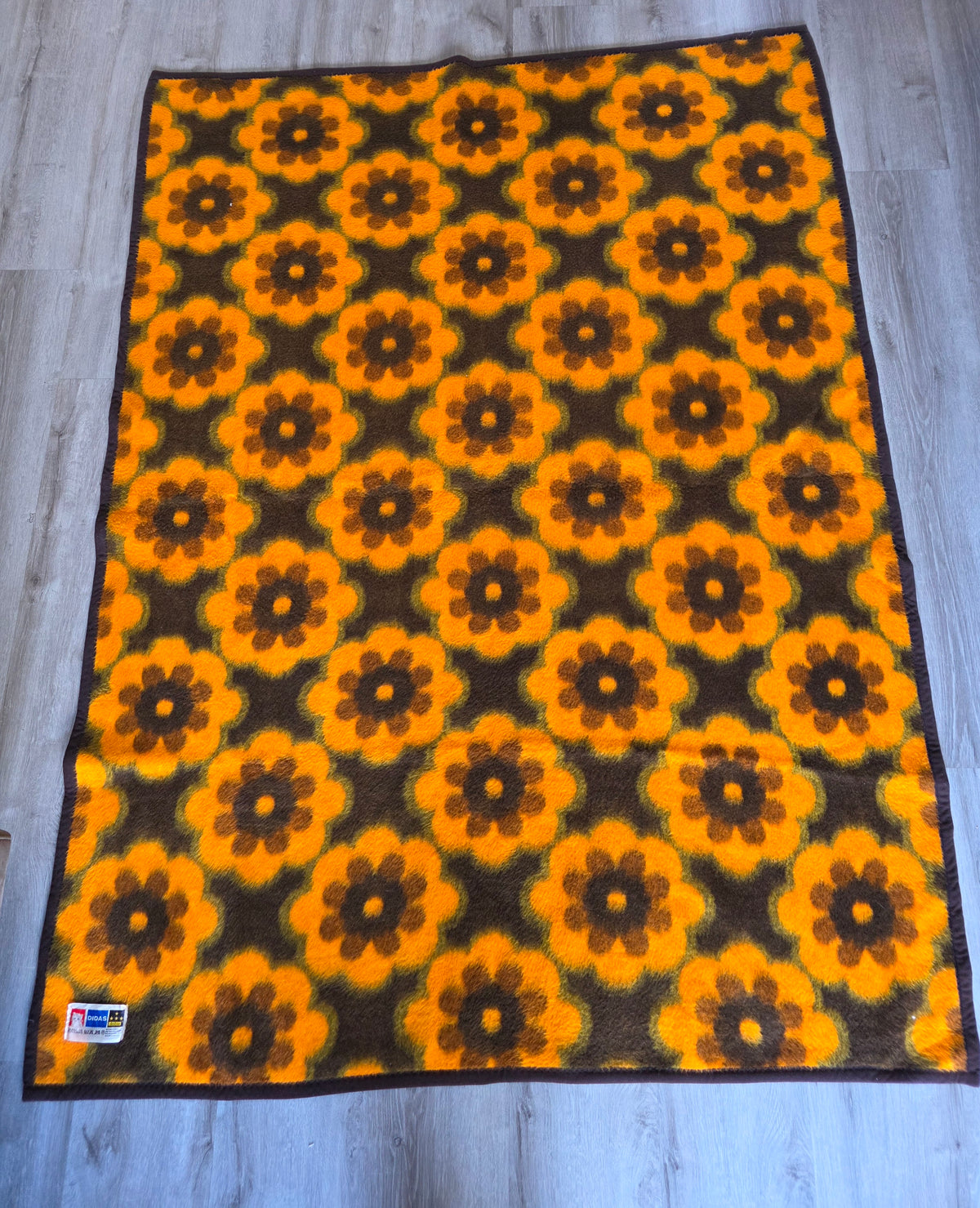 Didas deken oranje bruin groen bloemen
