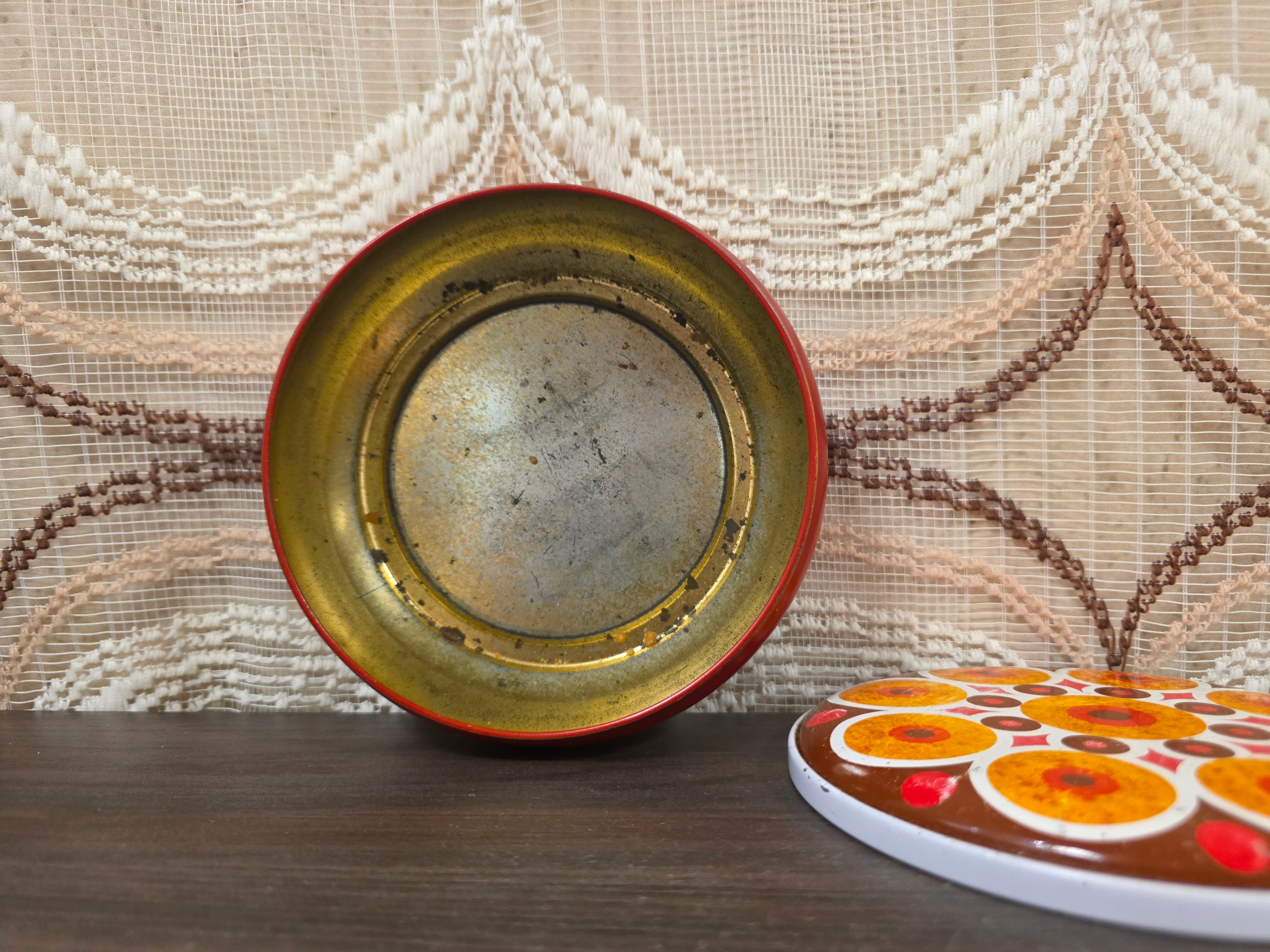 Vintage rond blik met cirkelpatroon