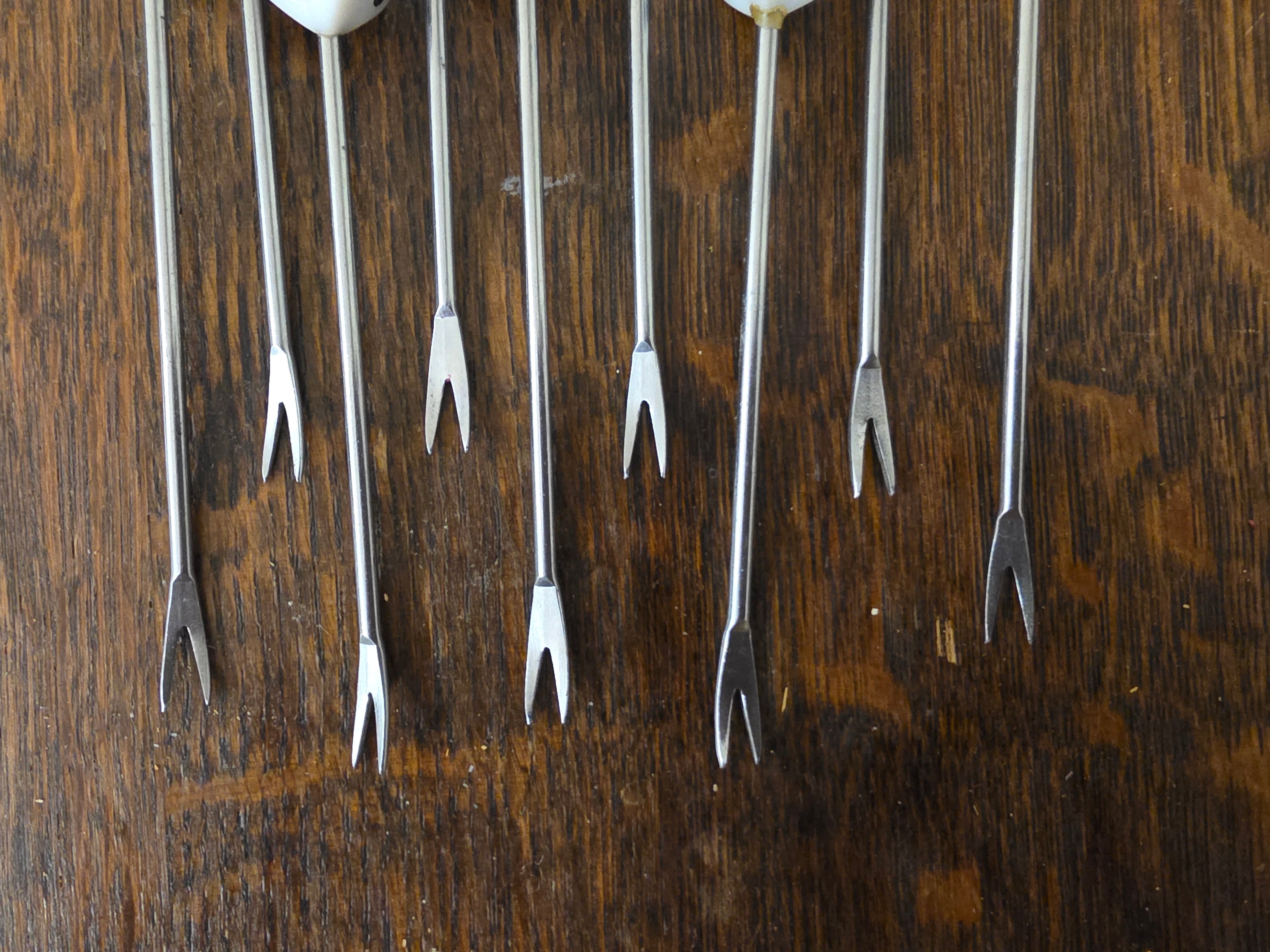 Vintage cocktailvorkjes met dobbelstenen