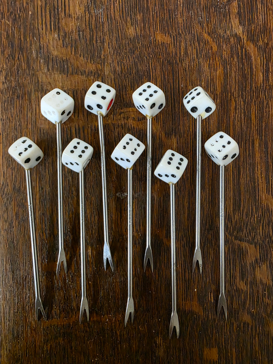 Vintage cocktailvorkjes met dobbelstenen