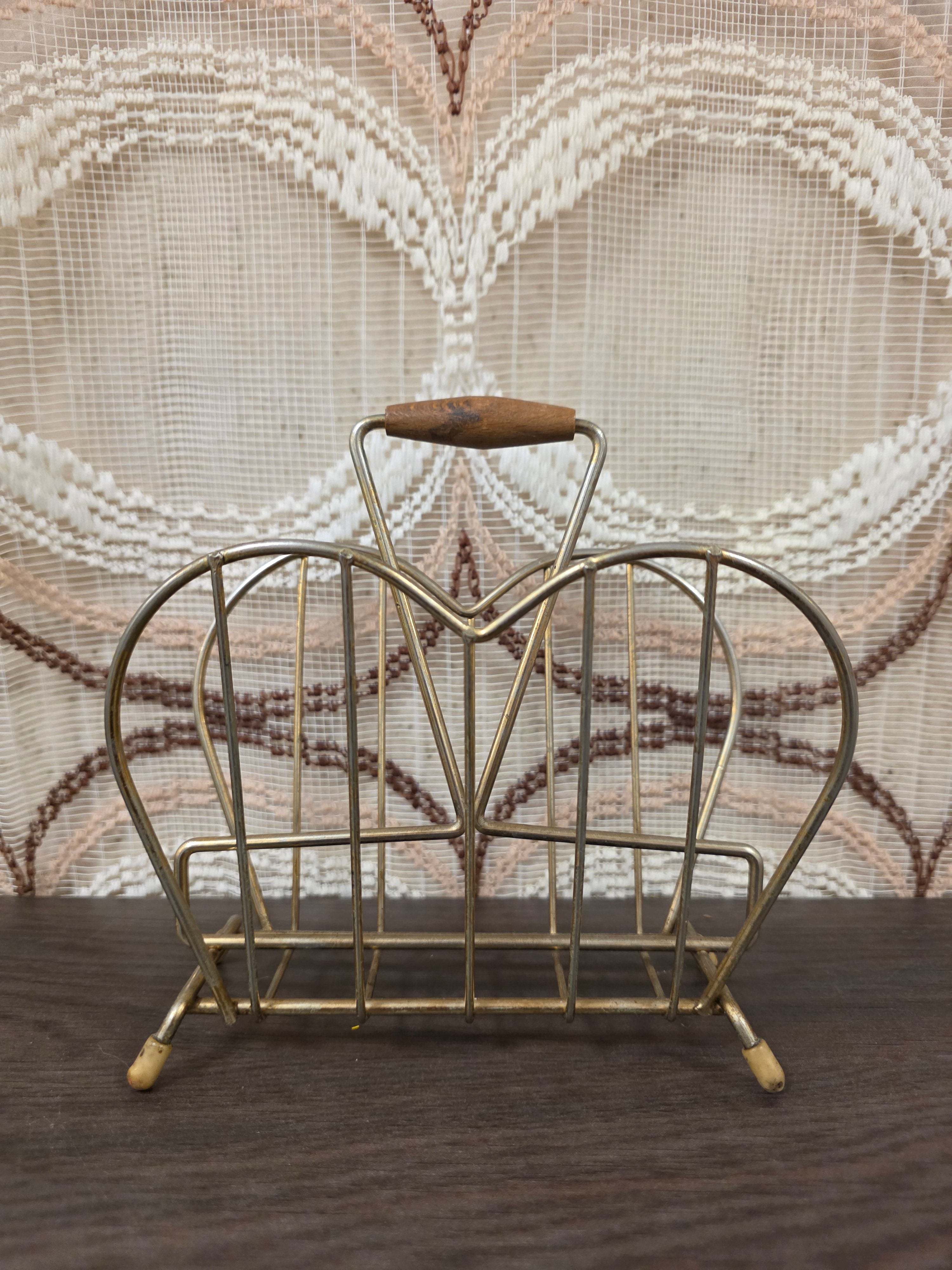 Vintage metalen servethouder met houten handgreep