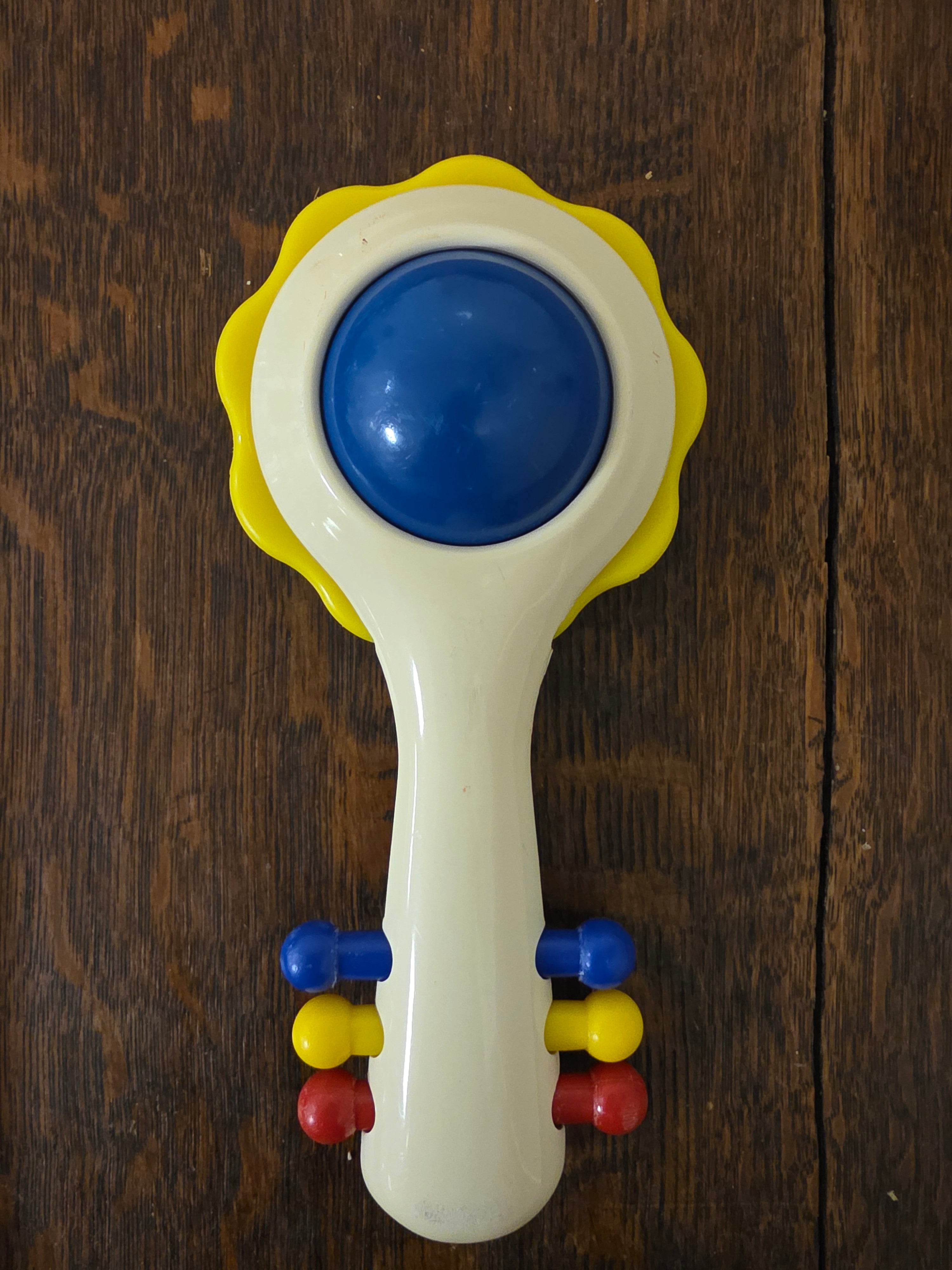 Ambi Toys Handy Dandy rammelaar gele rand