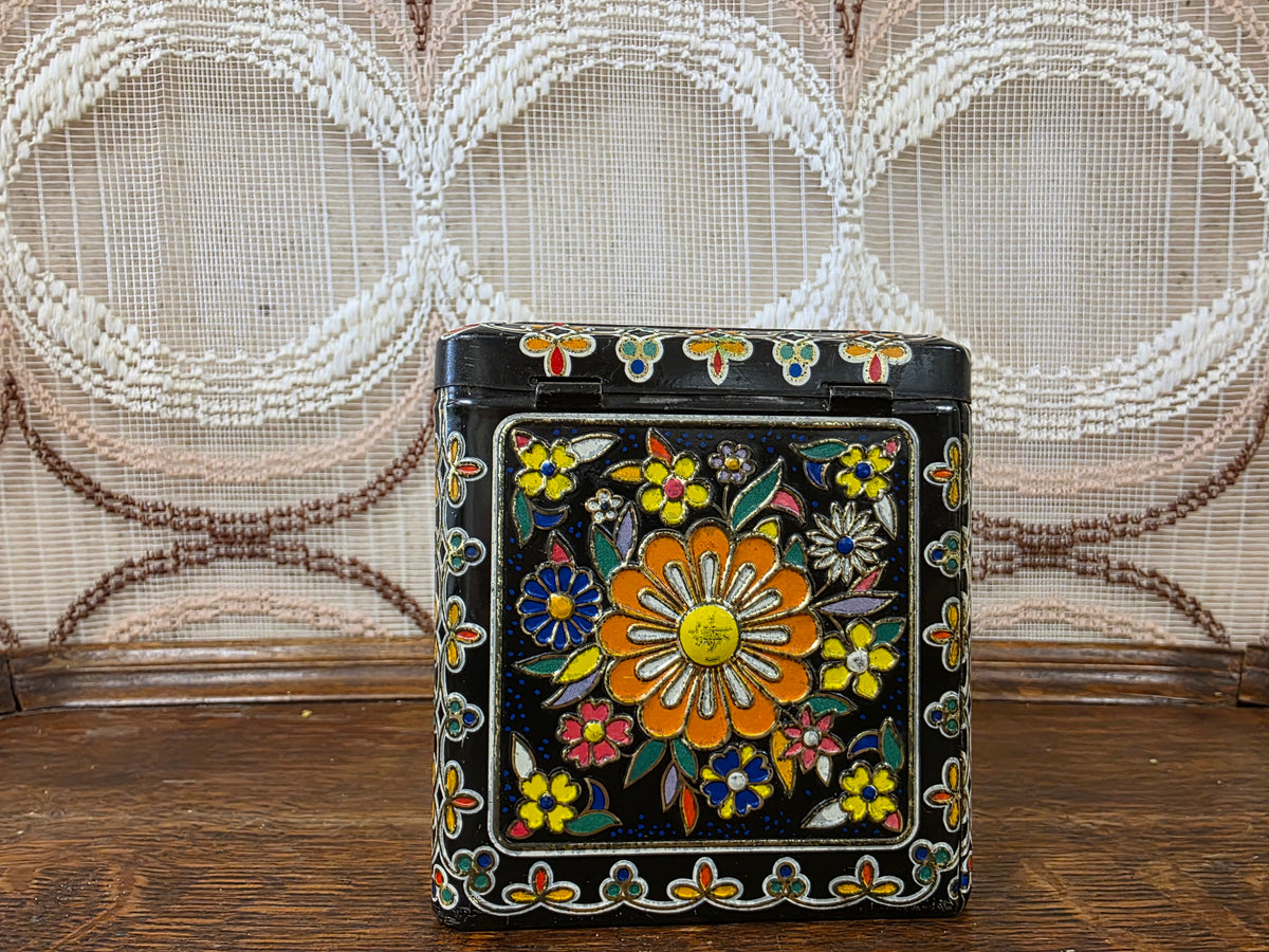Vintage zwart bloemenblik kleurrijk decor