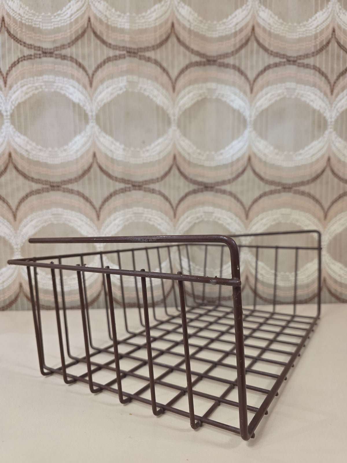 Vintage metalen draadmand bruin