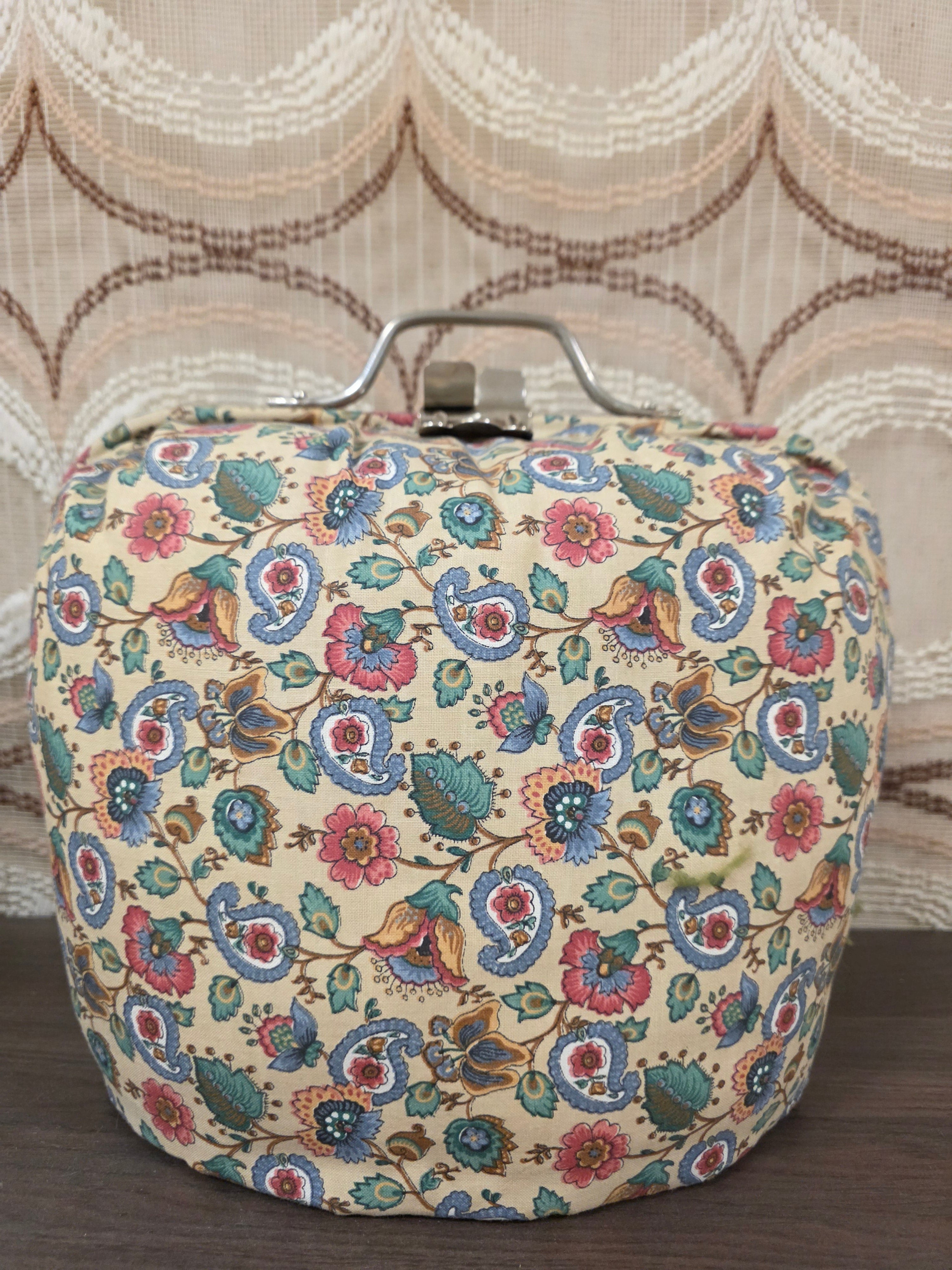 Vintage Douwe Egberts theebeurs met bloemenprint en metalen knip