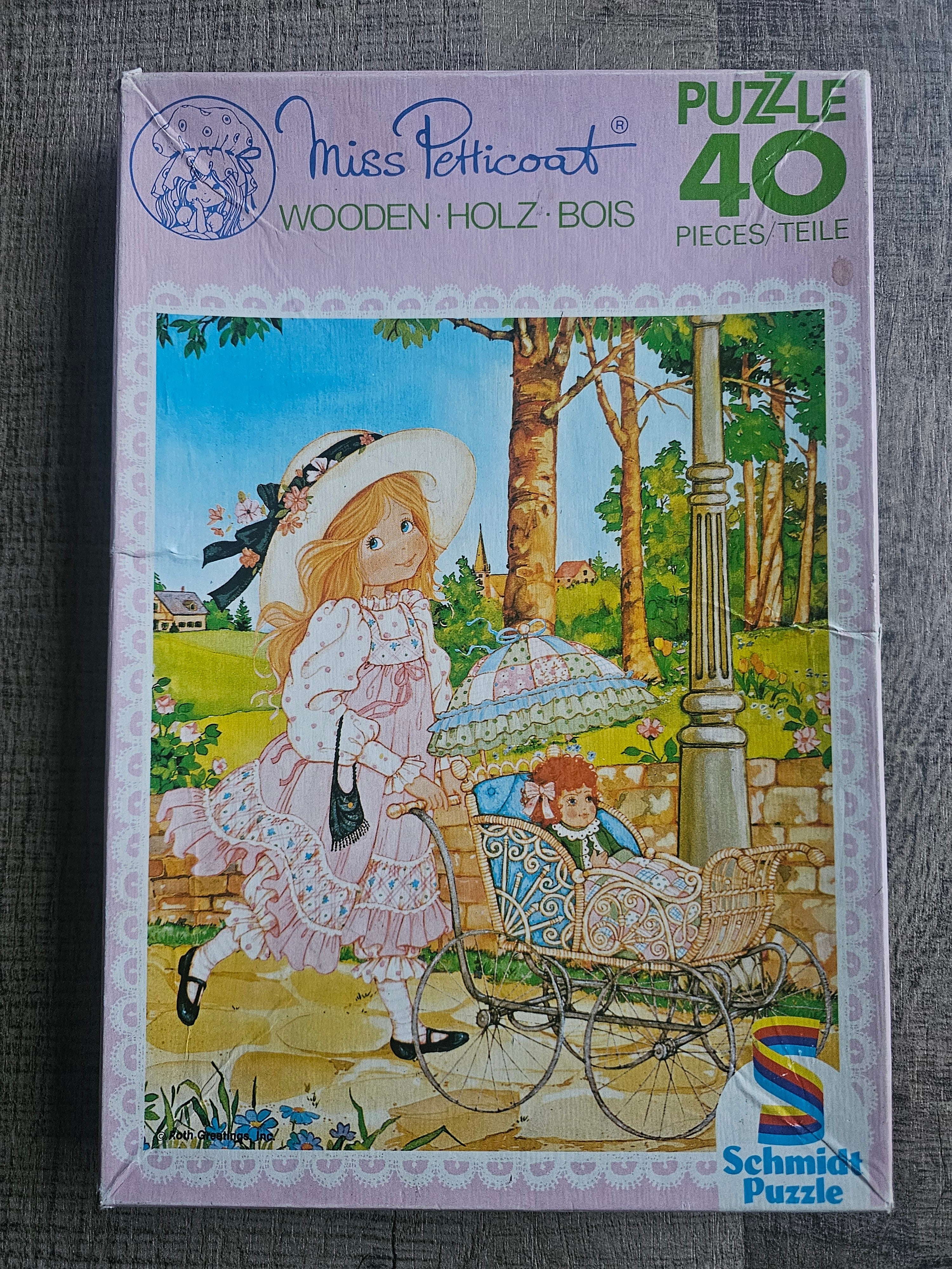 Houten puzzel Miss Petticoat met meisje en poppenwagen – 40 stukjes