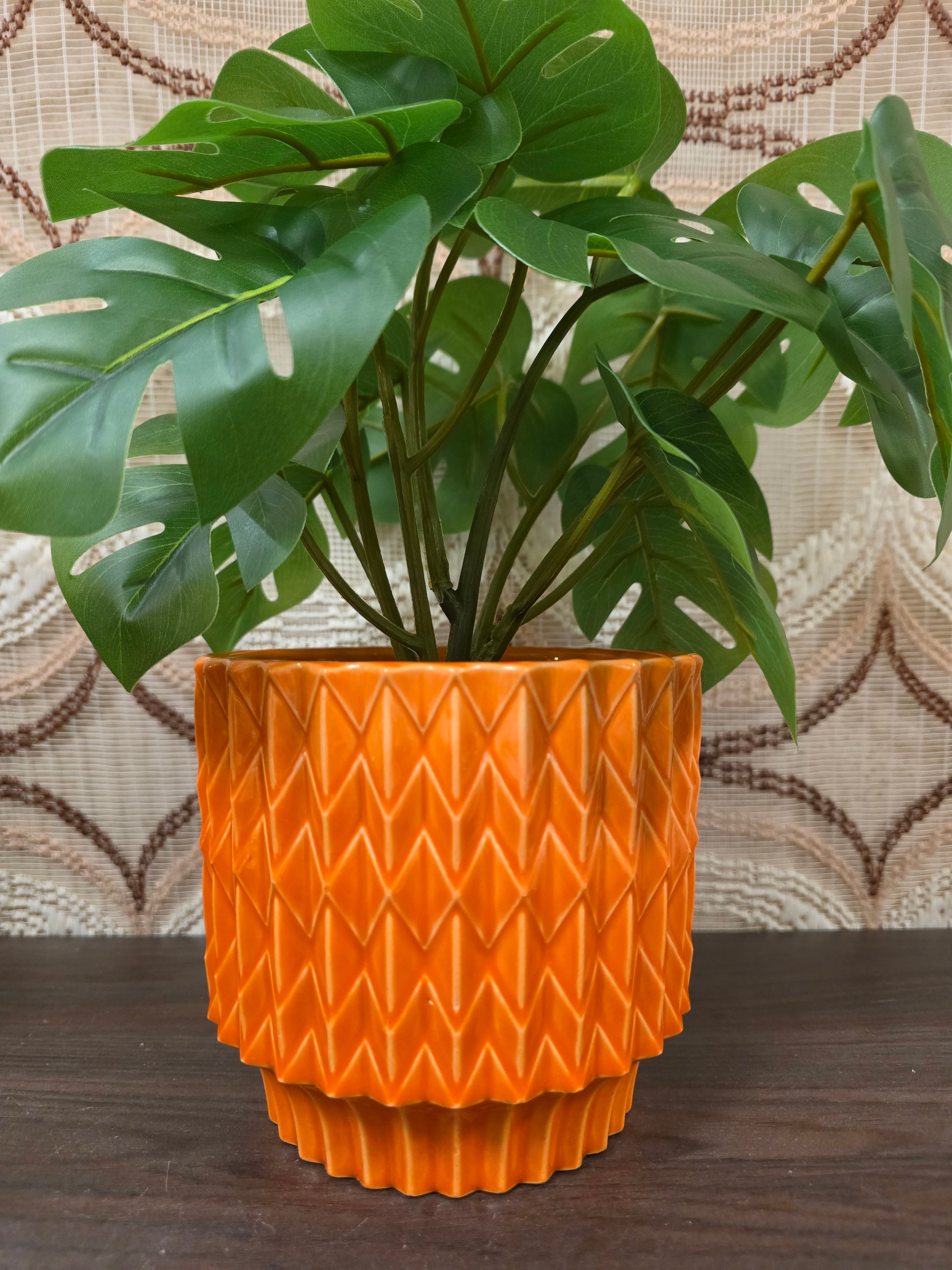 Oranje keramieken bloempot met reliëfpatroon, vintage, 12,5 cm hoog