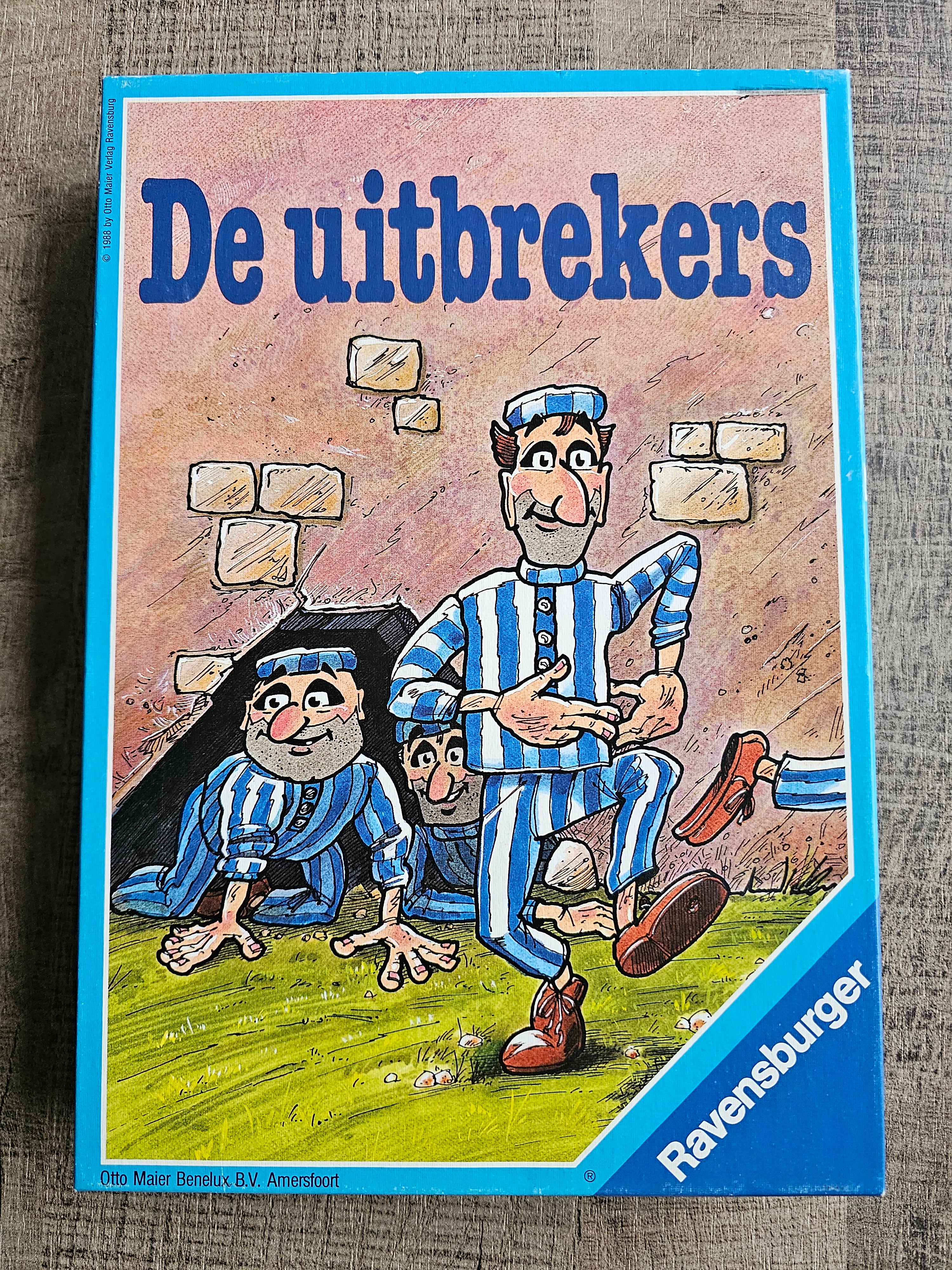 De Uitbrekers bordspel van Ravensburger met boeven en boten, achterkant doos met spelregels