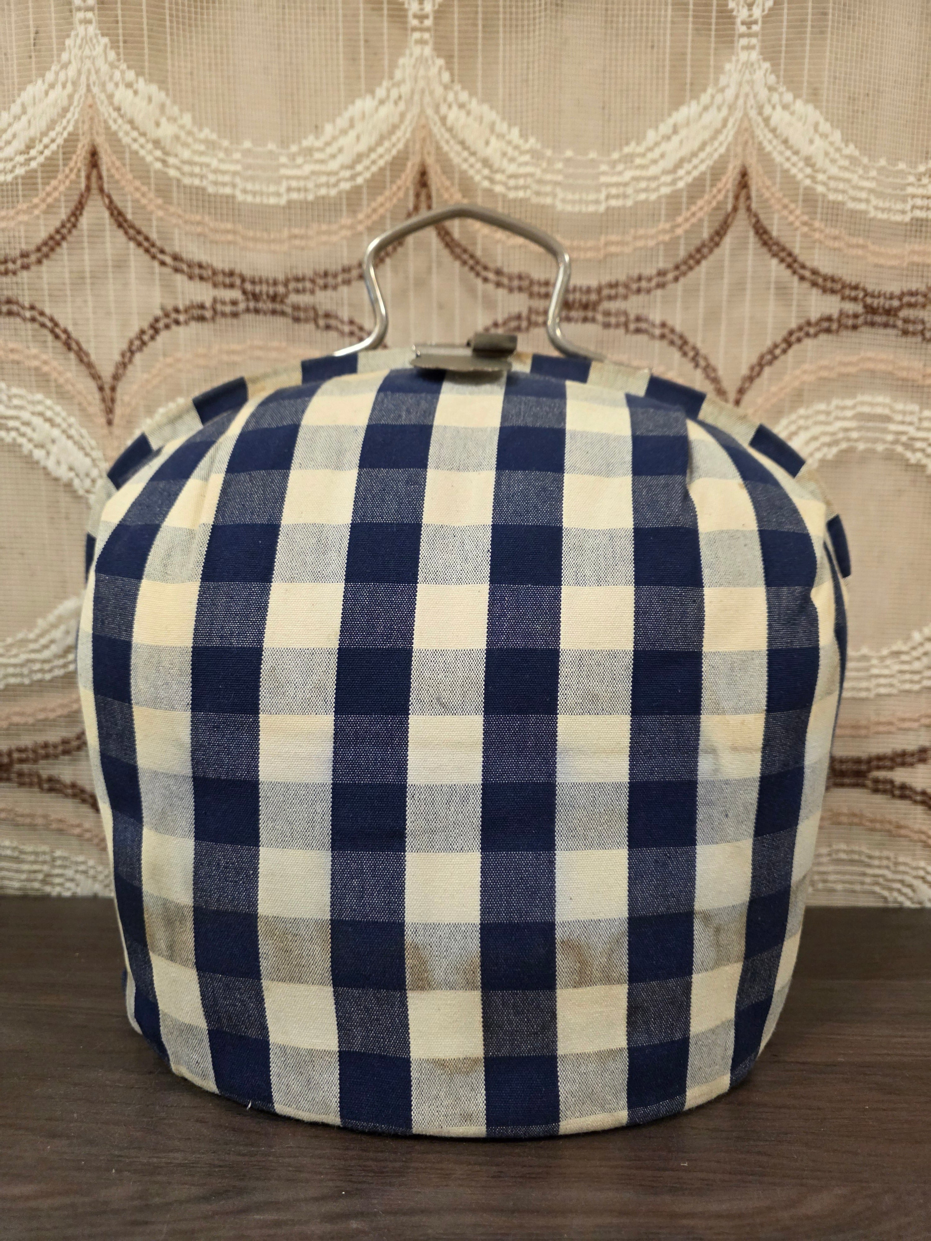 Gebruikte vintage theebeurs Douwe Egberts blauw wit geblokt met knip