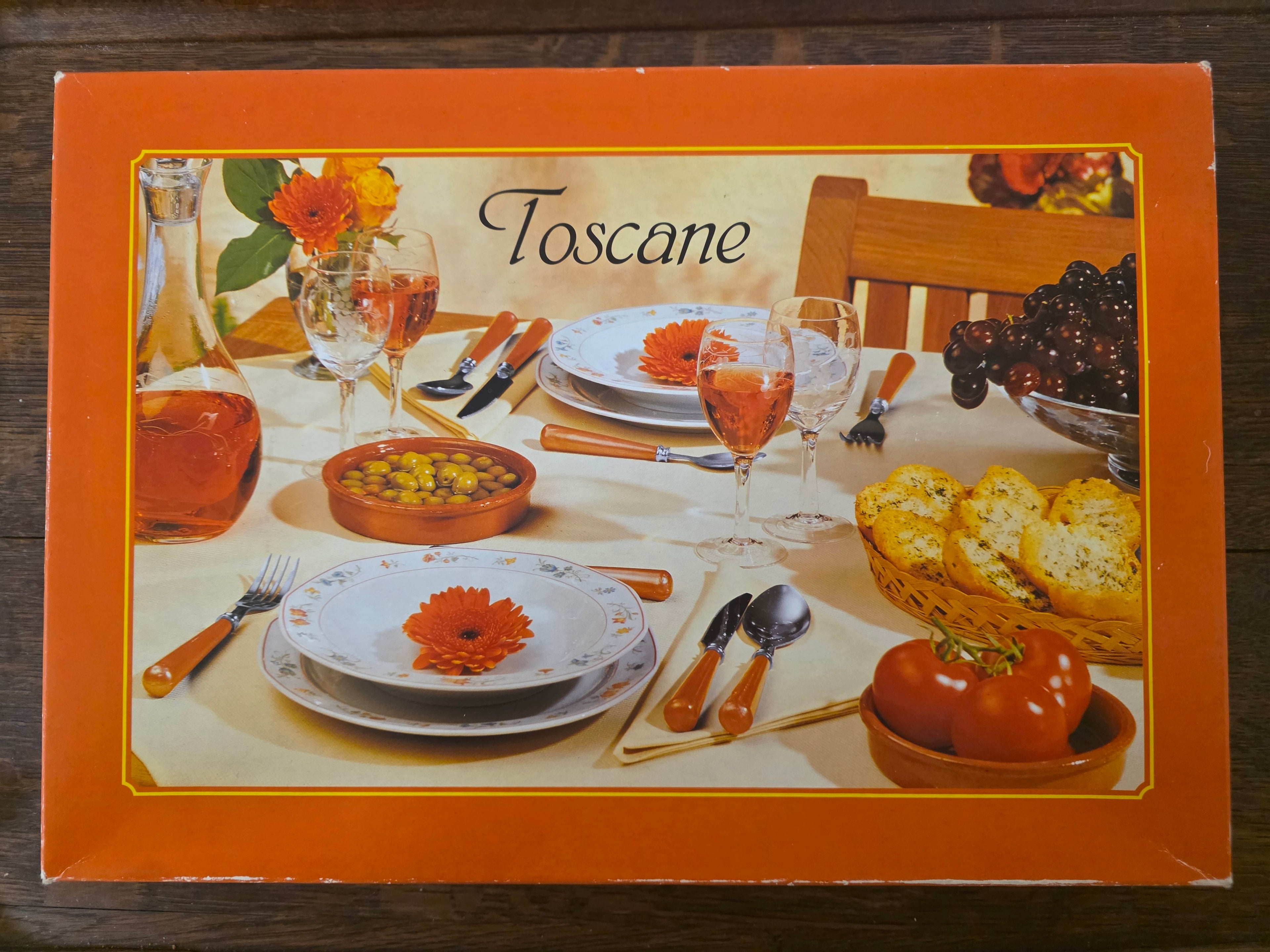 Vintage bestekset Toscane 16 delig nieuw in doos met oranje handgrepen