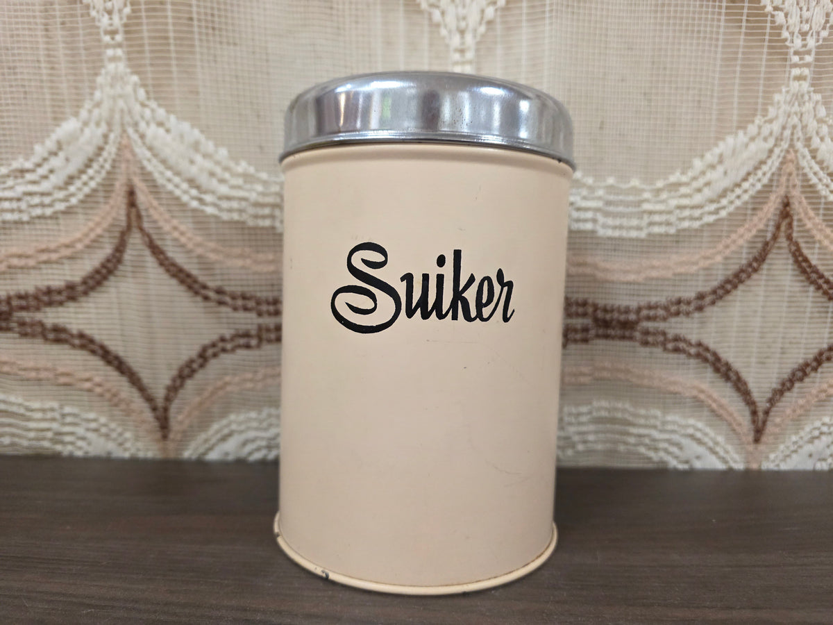 Crèmekleurig Brabantia suikerblik met zwarte letters en metalen deksel