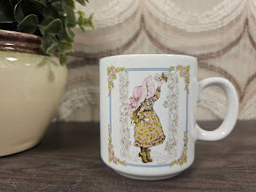 Sarah Kay vintage beker meisje met bloemenjurk en strik