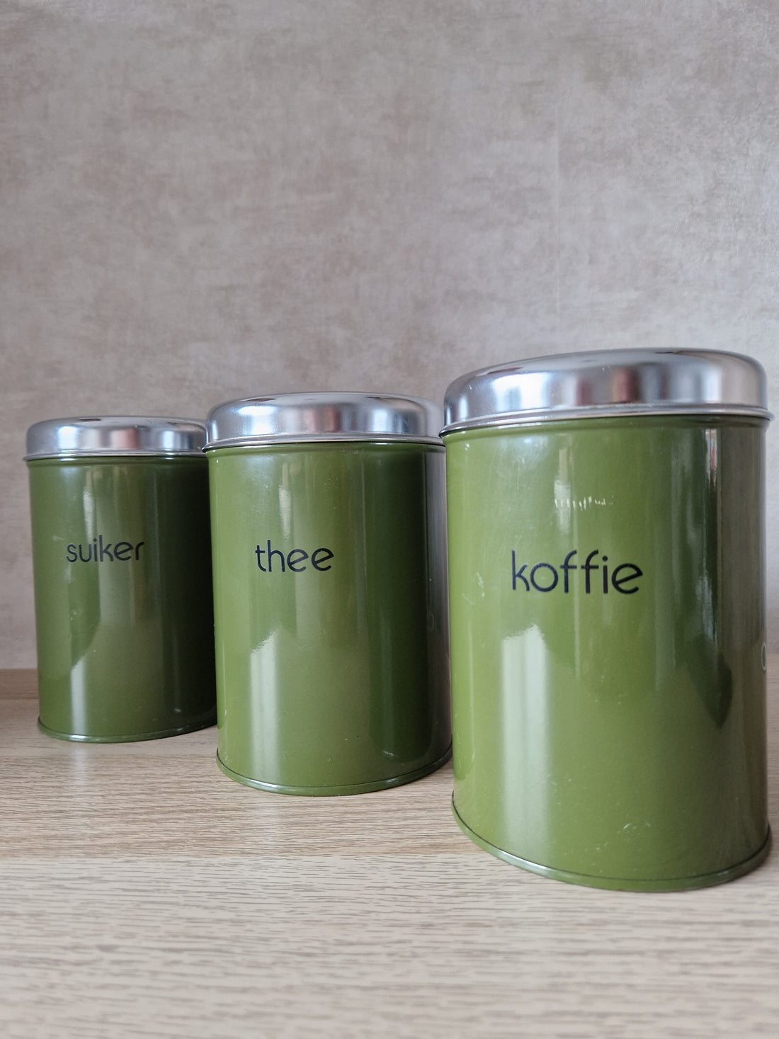 Groene blikken koffie thee suiker